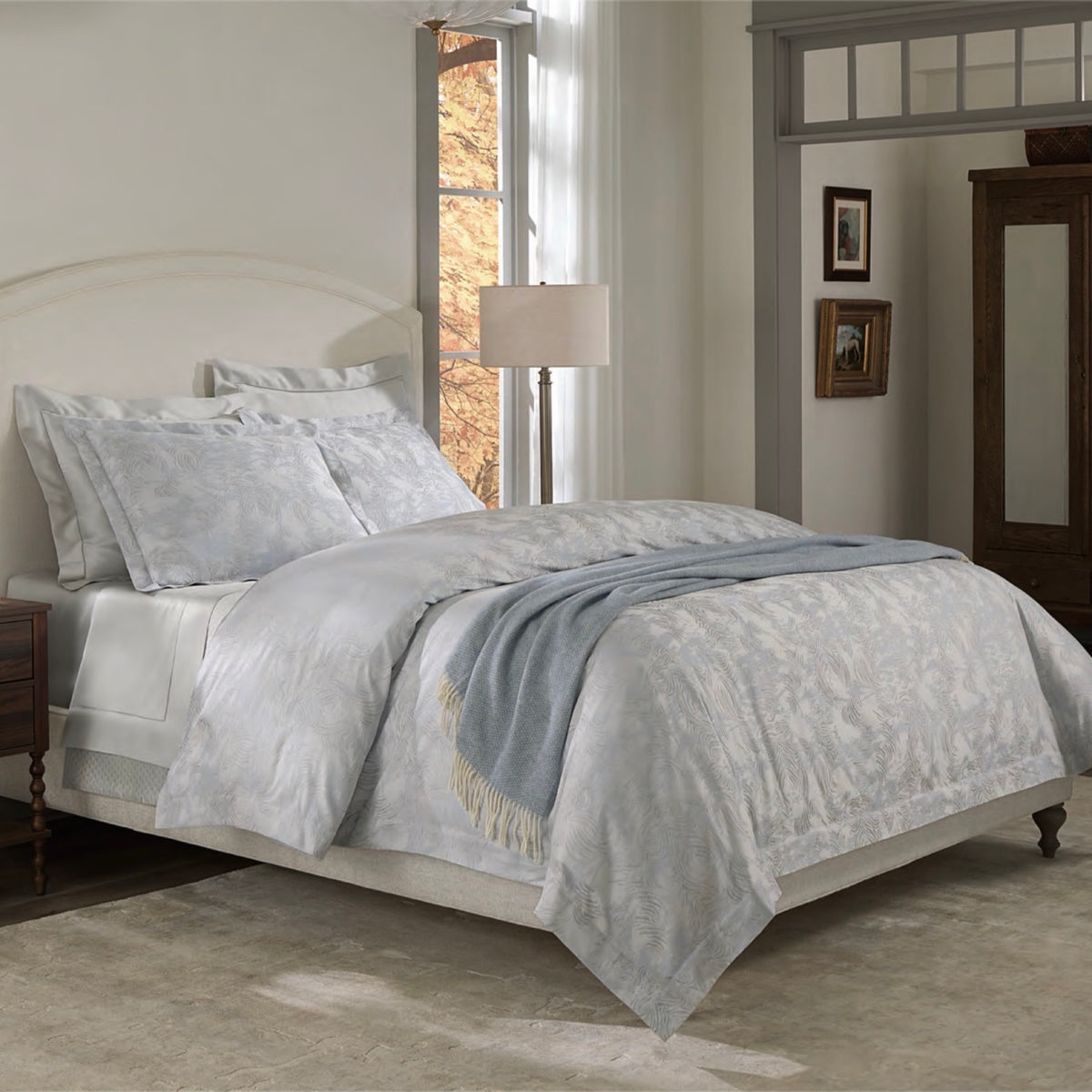 Sferra Riflesso 3763 Lunar duvet cover and shams, SFERRA Giza 45 Sateen 1840 Tin flat sheet, fitted sheet and pillowcases, Bari 743 Tin
coverlet, Cervino 11038 Sea decorative throw