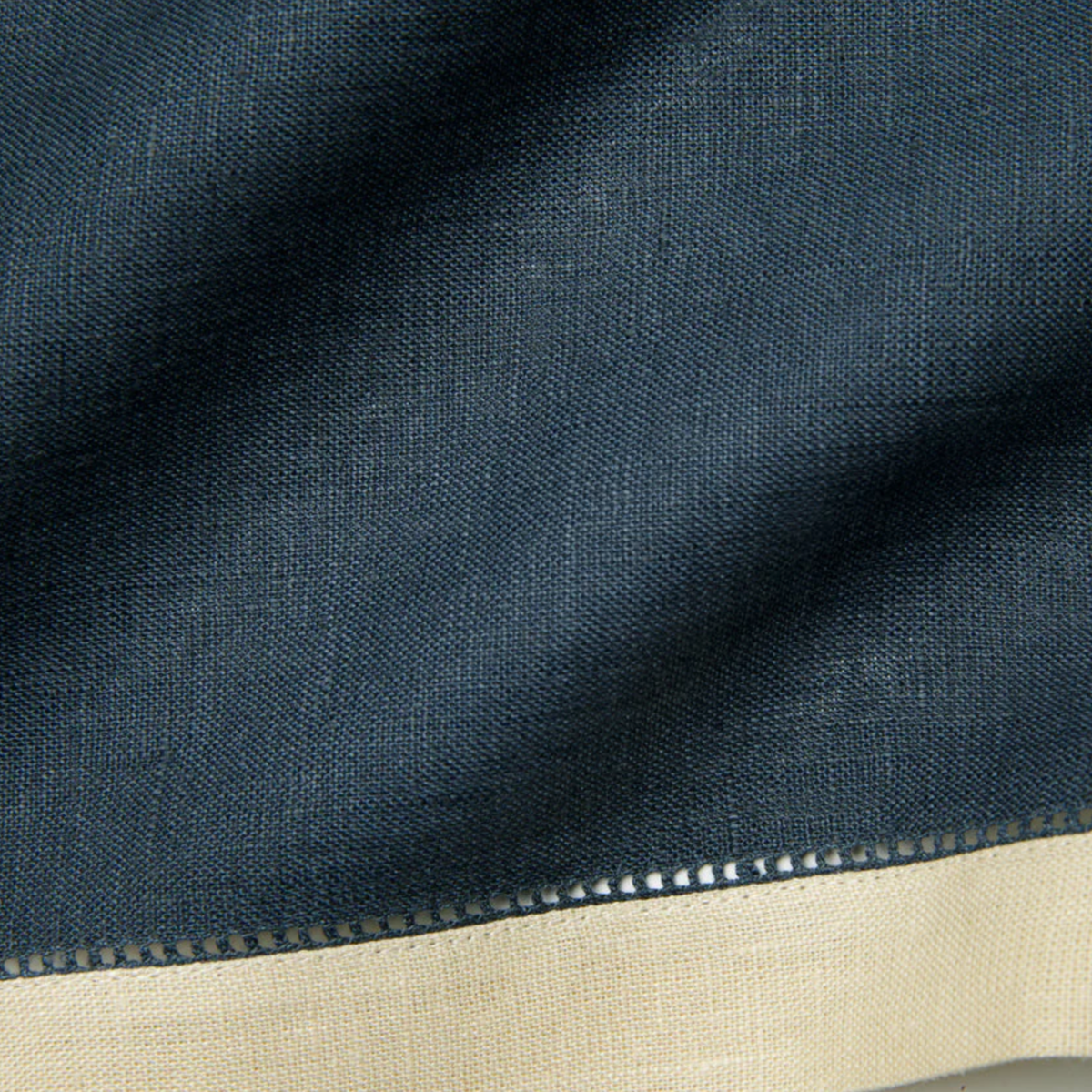 Closeup of Sferra Roma Napkin Fabric in Indigo and Stone Color