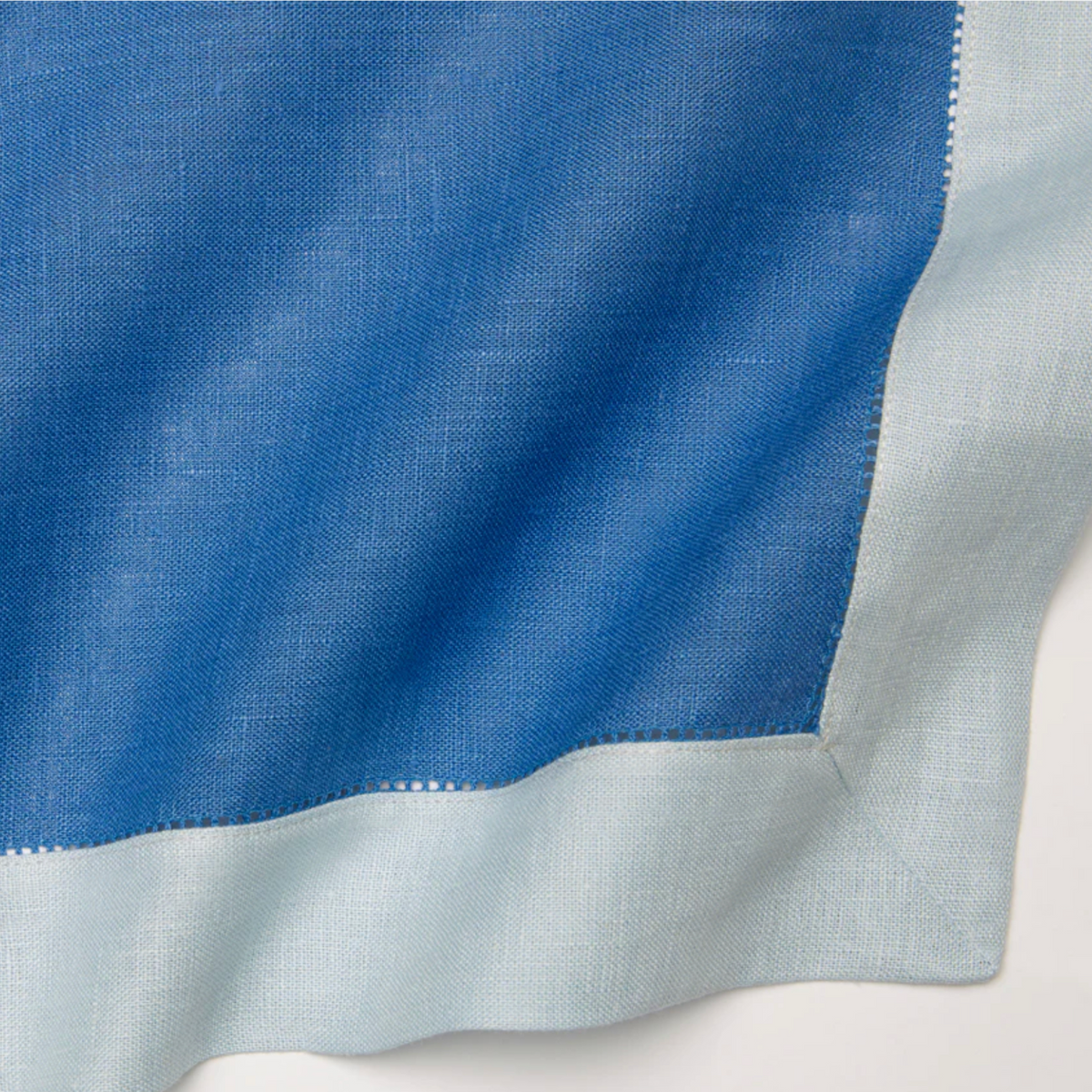 Closeup of Sferra Roma Placemat Fabric in Ocean and Sky Color