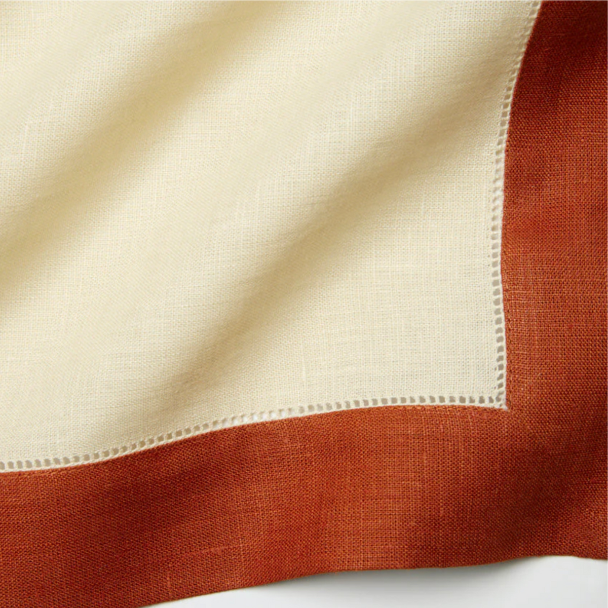Closeup of Sferra Roma Placemat Fabric in Paprika and Stone Color