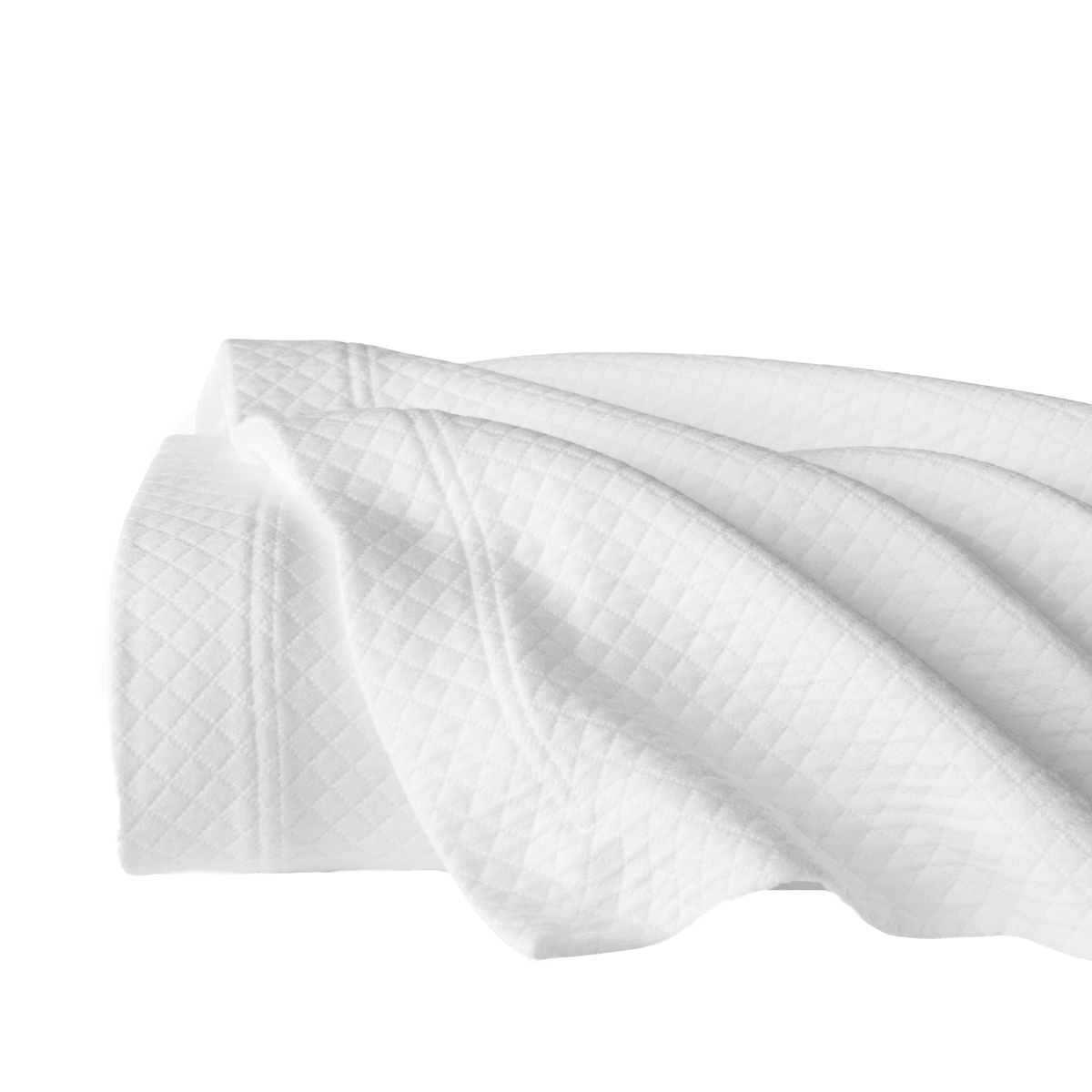 Folded Sferra Rombo Coverlet in White Color