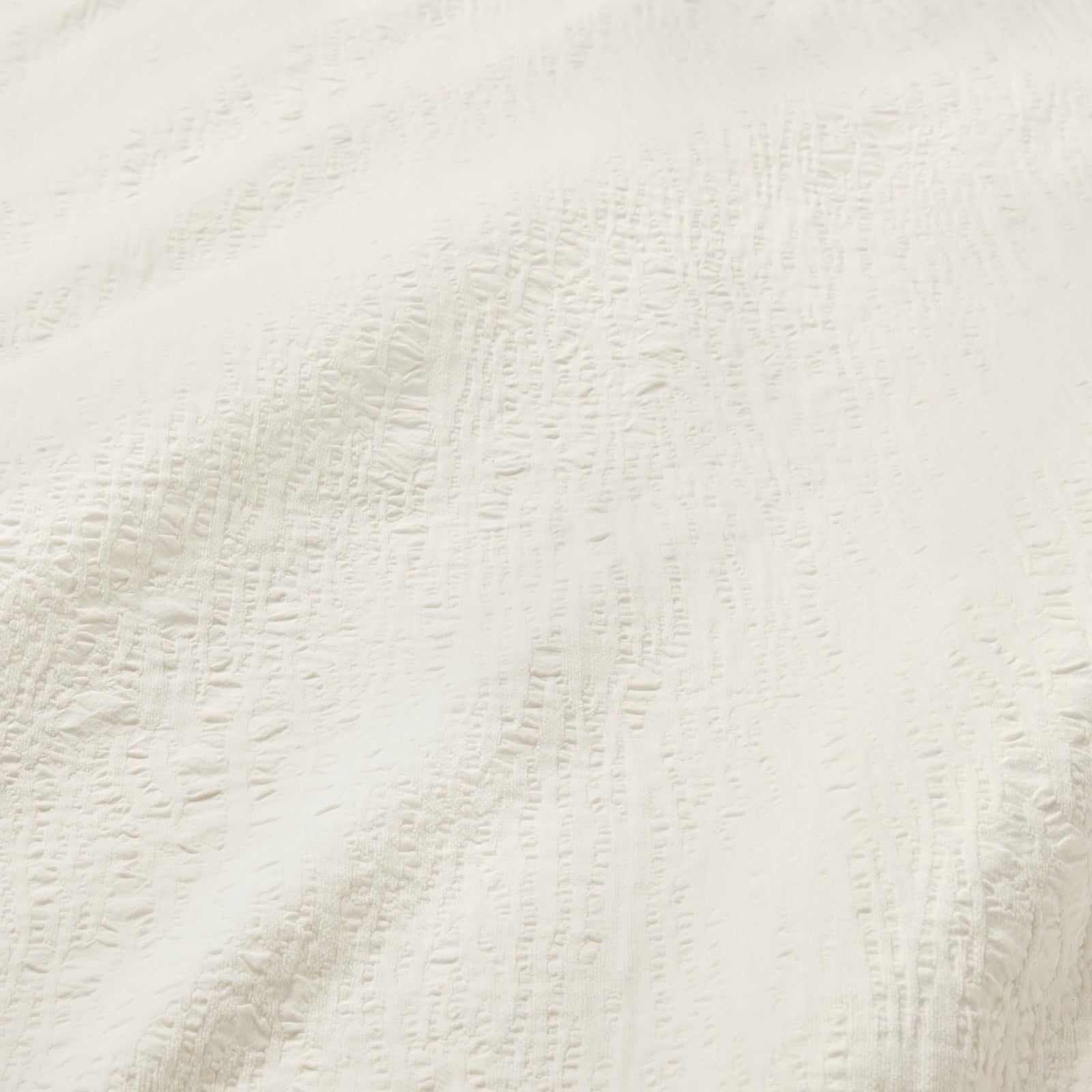 Folded Sferra Sabino Coverlet in Oyster color