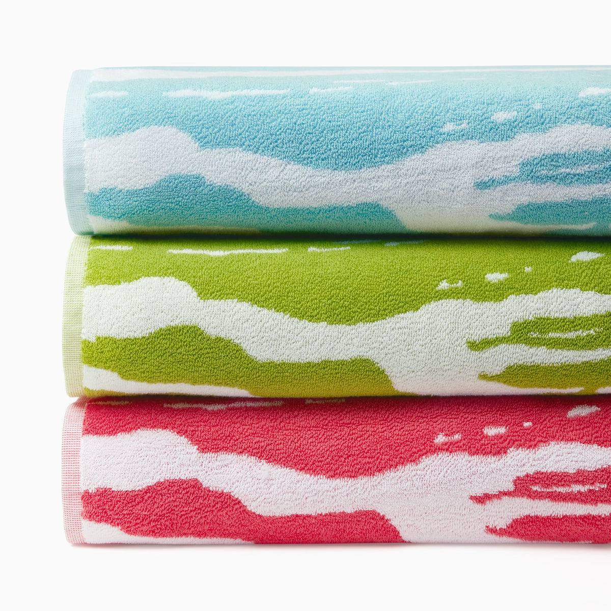 Stack of Sferra Sampieri Beach Towels in all colors