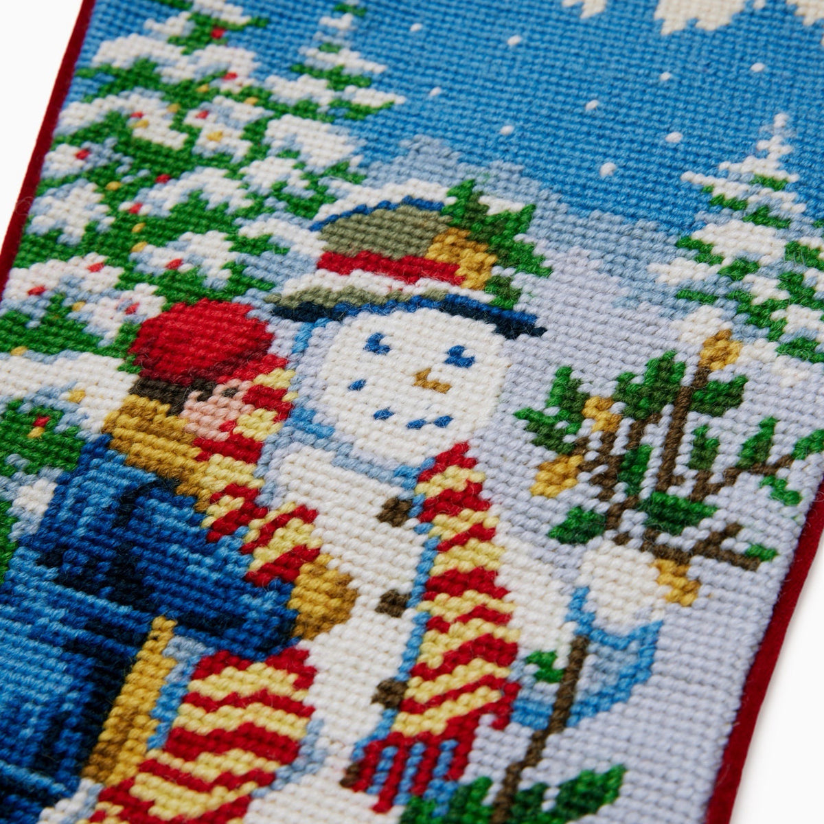 Closeup of Sferra Snowman Boy Holiday Stocking in Red