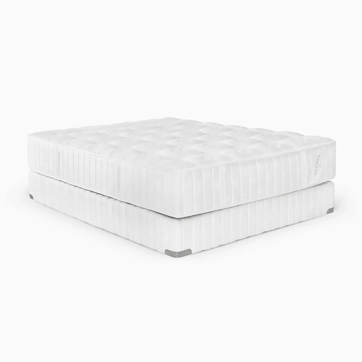 A white Luxury Sferra Sonno Notte CV Luxury Firm Mattress with a quilted top is stacked on a box spring, perfect for supportive, restful sleep.