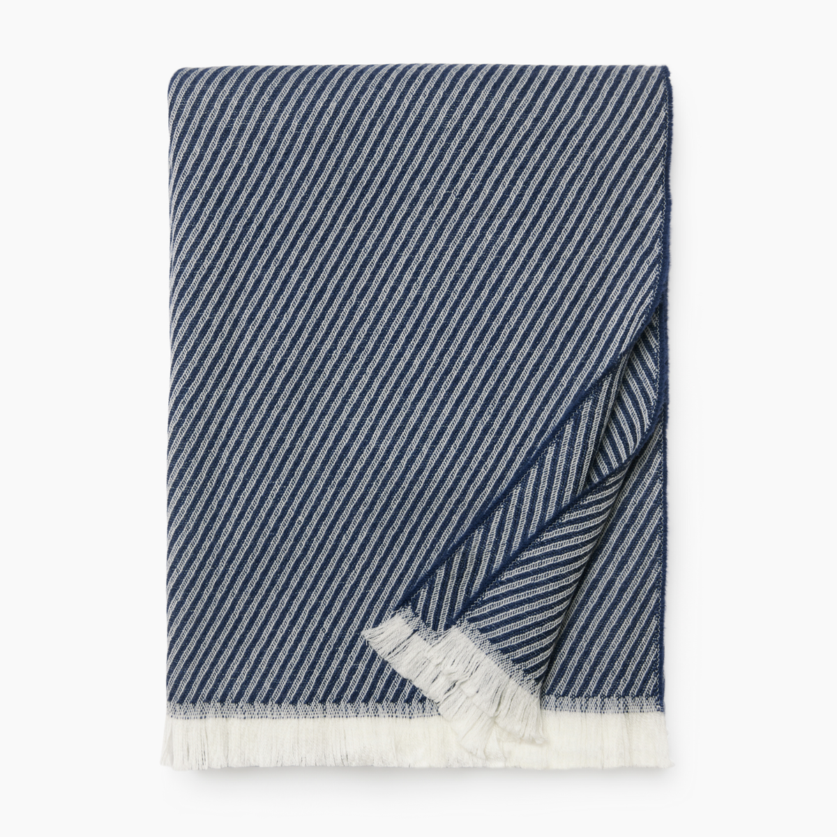 Folded Sferra Taormina Throw in Navy color against a white background