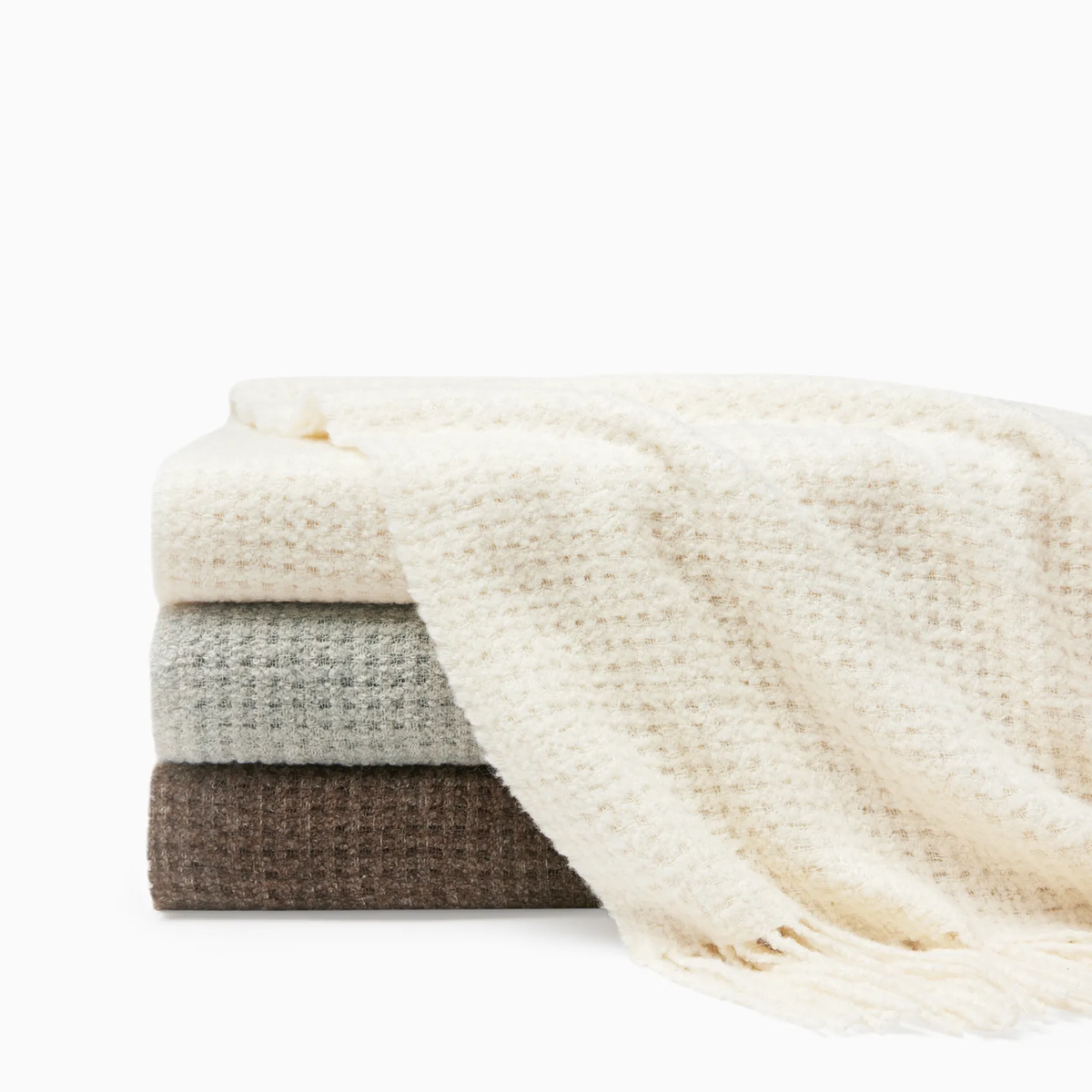Stack of Sferra Terranova Throws in Ivory, Grey and Khaki