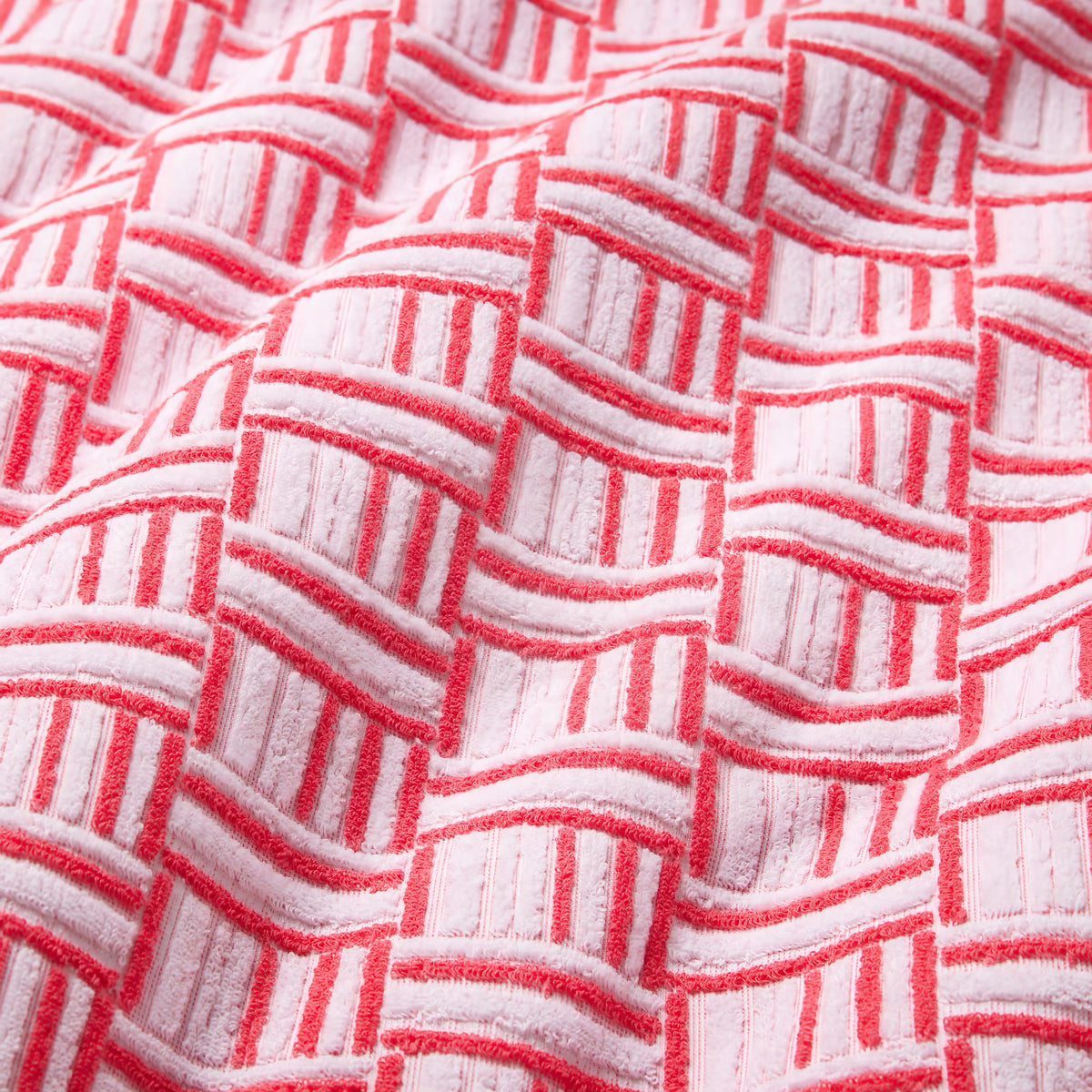 Fabric Closeup of Sferra Tirreno Beach Towels in Coral color