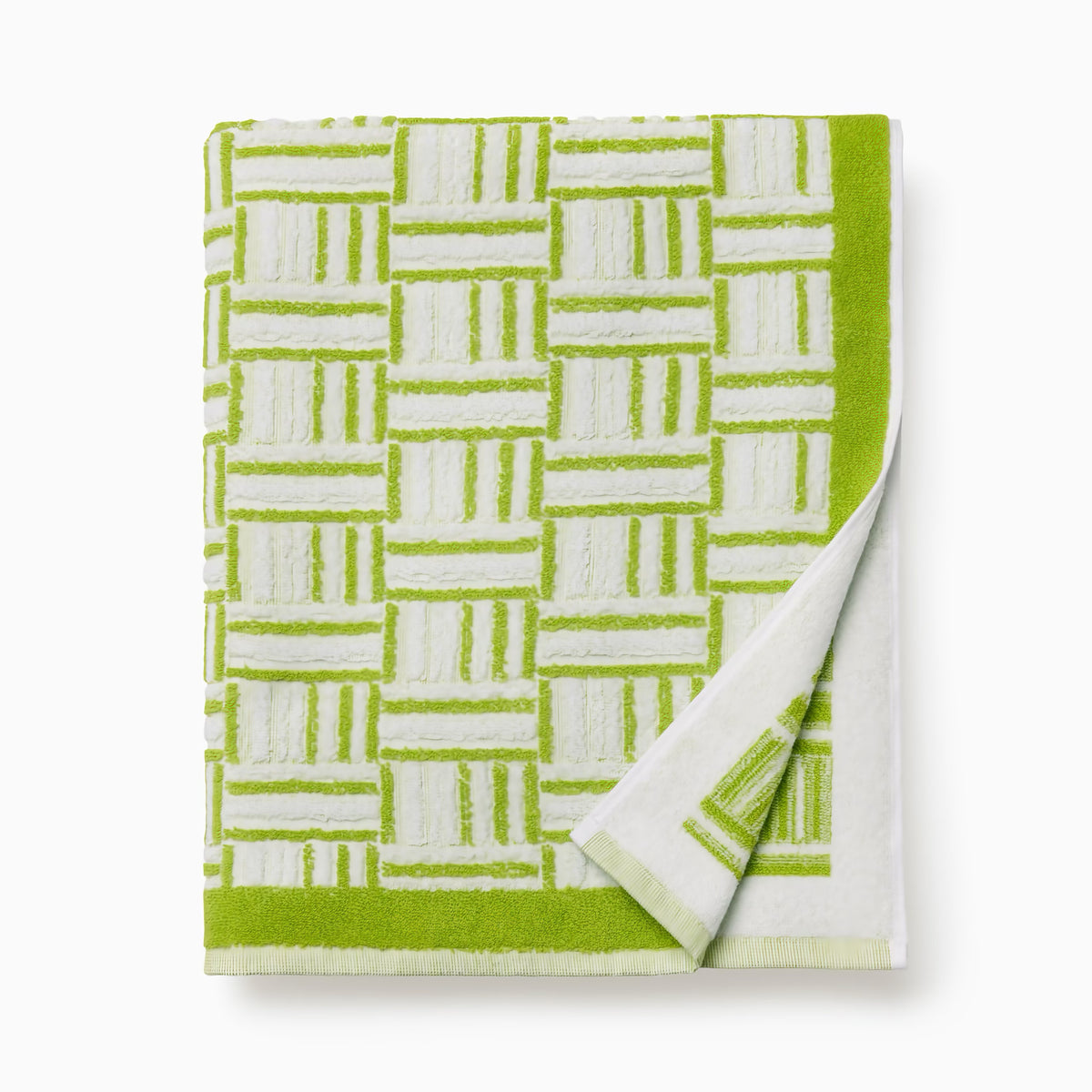 Folded Sferra Tirreno Beach Towels in Kiwi color