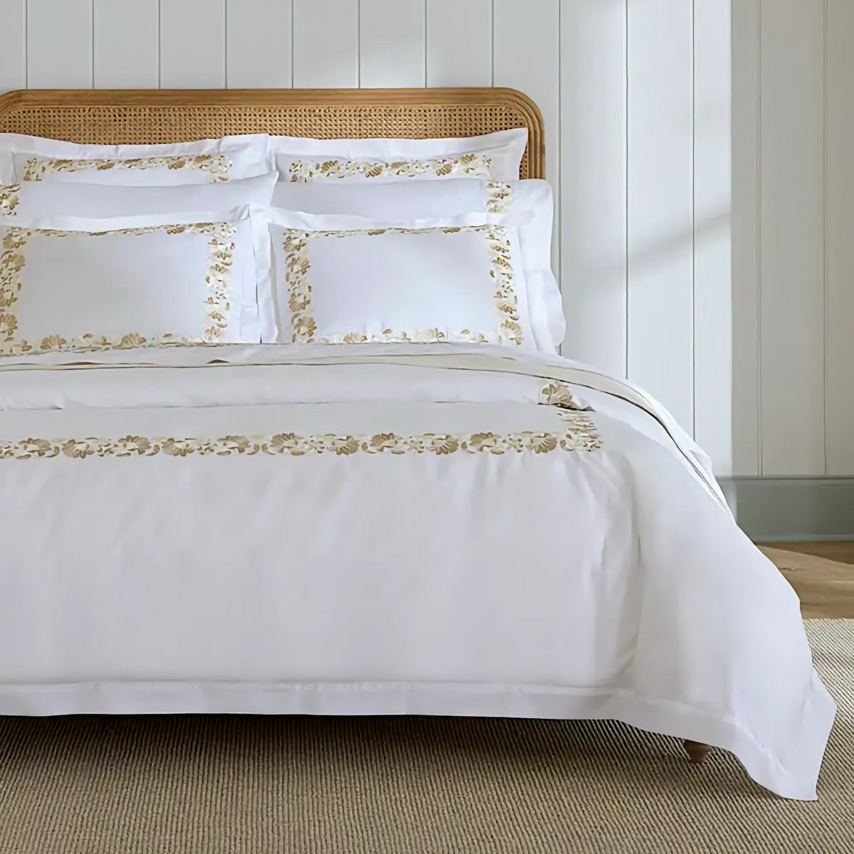 Closeup of Bed in White and Sand Sferra Tralcio Bedding