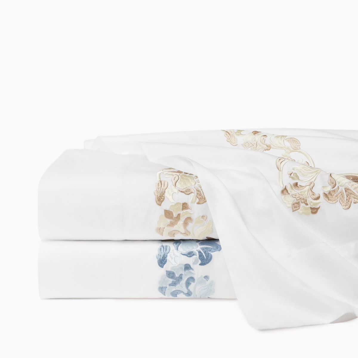 Stack of Sferra Tralcio Bedding Flat Sheets