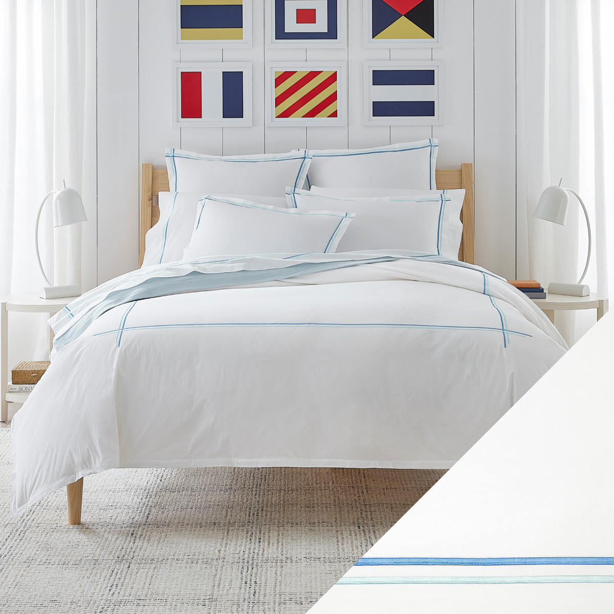 Full Lifestyle Image of Sferra Tratto Bedding with Swatch of White/Clearwater