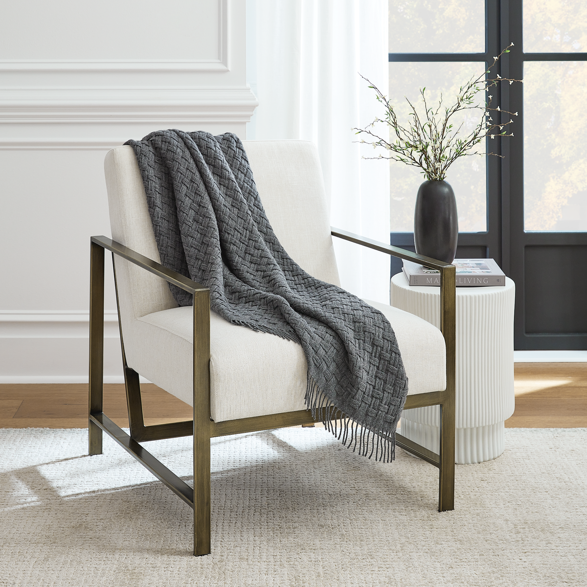 Lifestyle View of Sferra Vella Throws in Charcoal Color