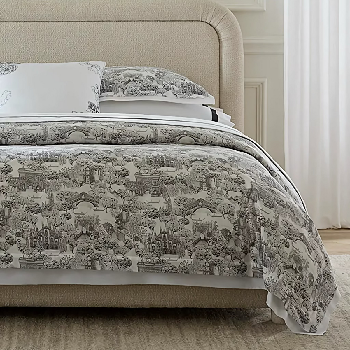 Closeup of Bed in White and Black Sferra Viaterra Duvet Cover and Shams