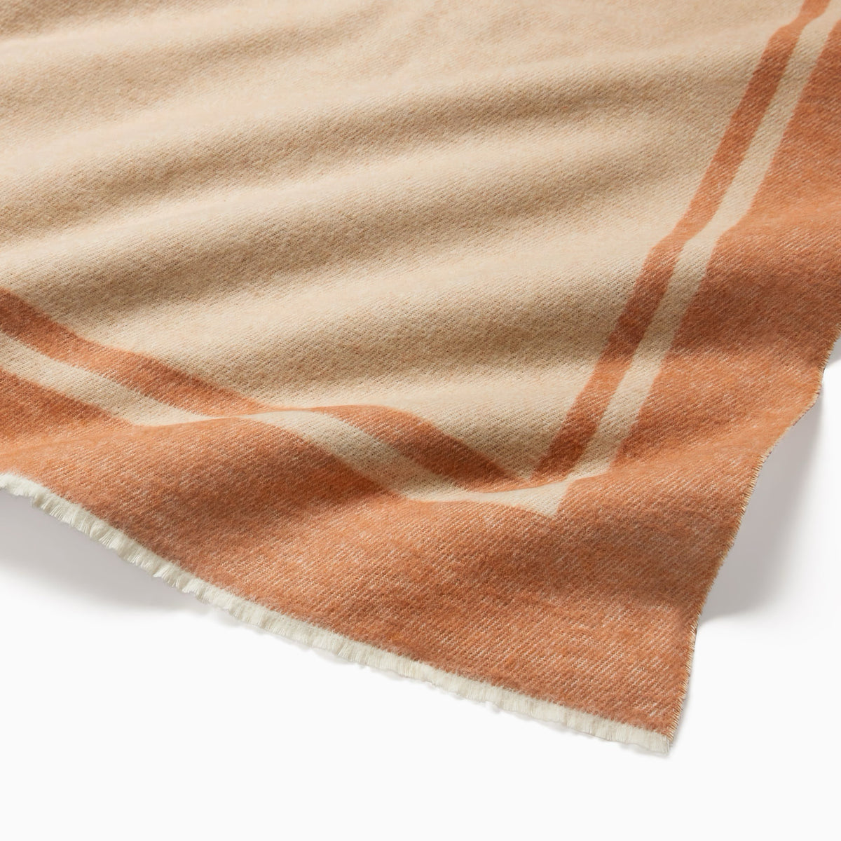 Detailed view of Sferra Viletta Throw Blanket in Sand/Rust