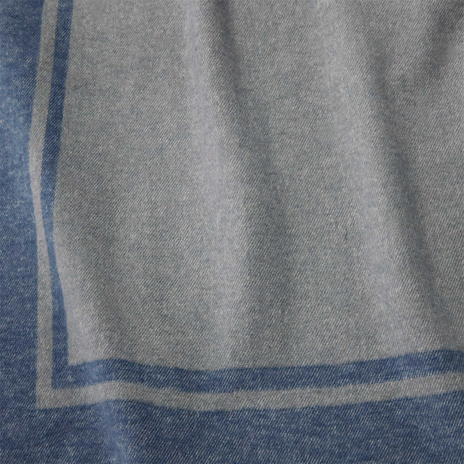 Folded Sferra Viletta Throw Blanket in Navy and Lunar Color