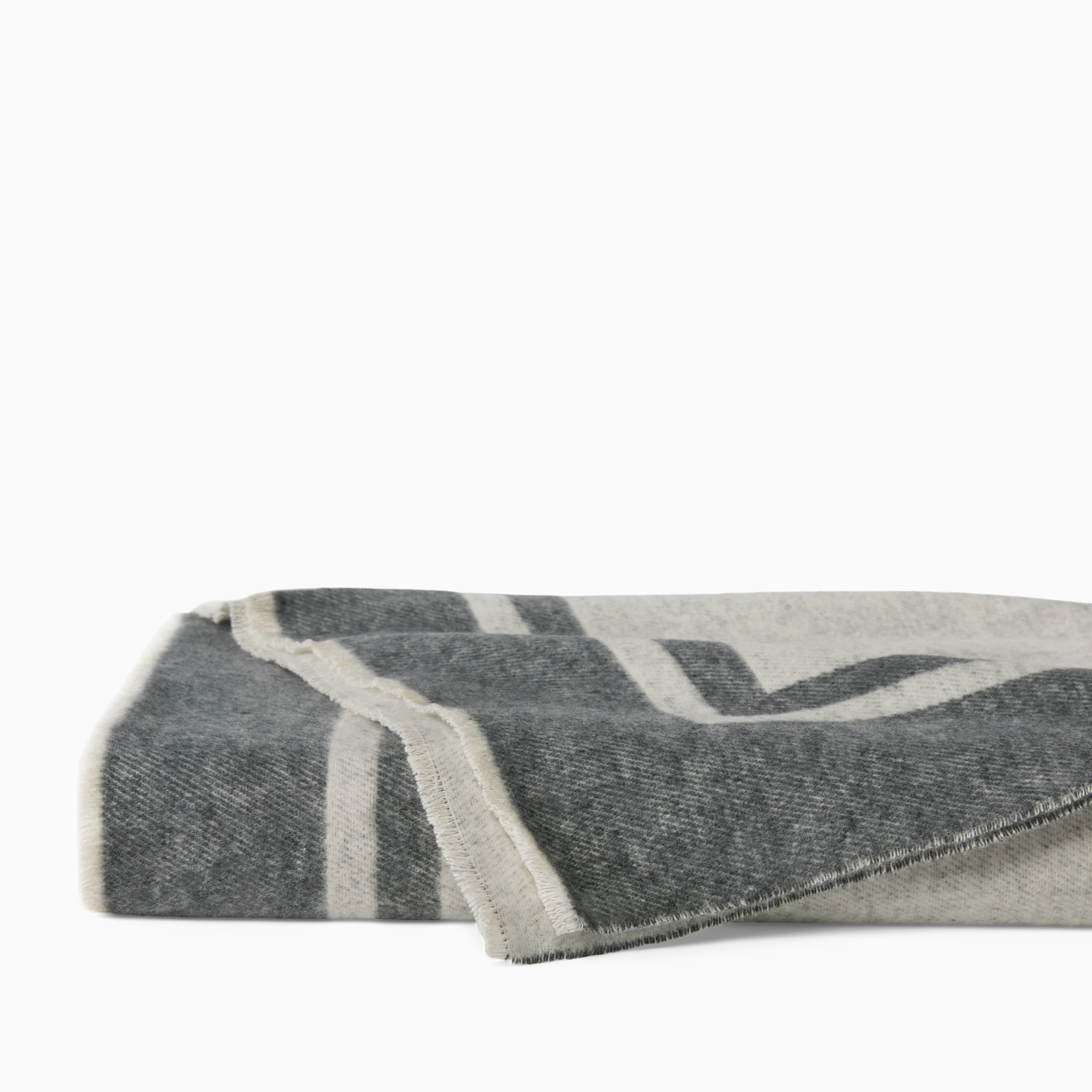 Folded Sferra Viletta Throw Blanket in Oat and Charcoal Color