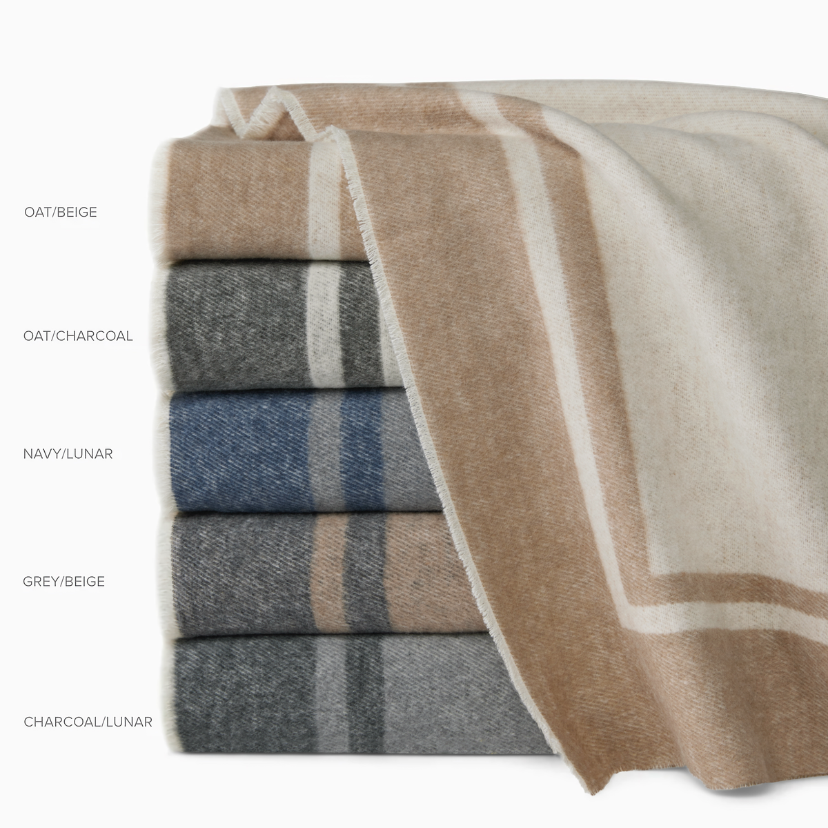 Stack of Sferra Viletta Throw Blankets in All Colors