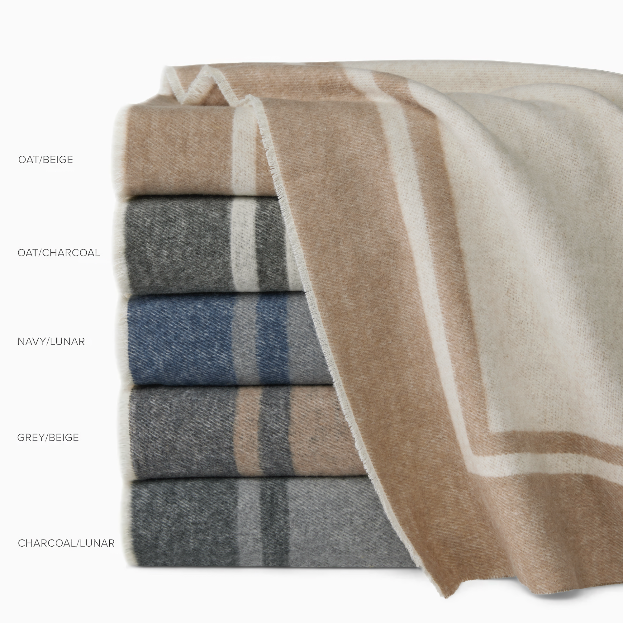 Stack of Sferra Viletta Throw Blankets in All Colors