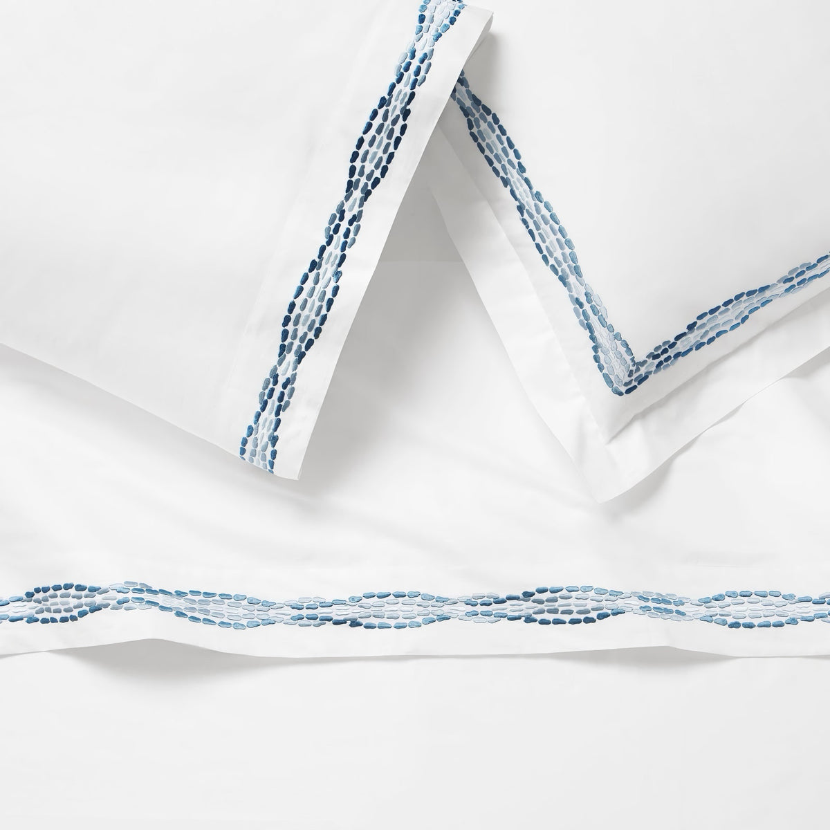 Detailed view of Sferra X Scalamandre Cobblestones Embroidered Bedding in White/Sea color