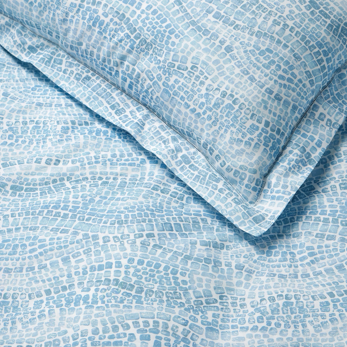Detailed view of Sferra X Scalamandre Cobblestones Duvet Cover and Shams in Sea color