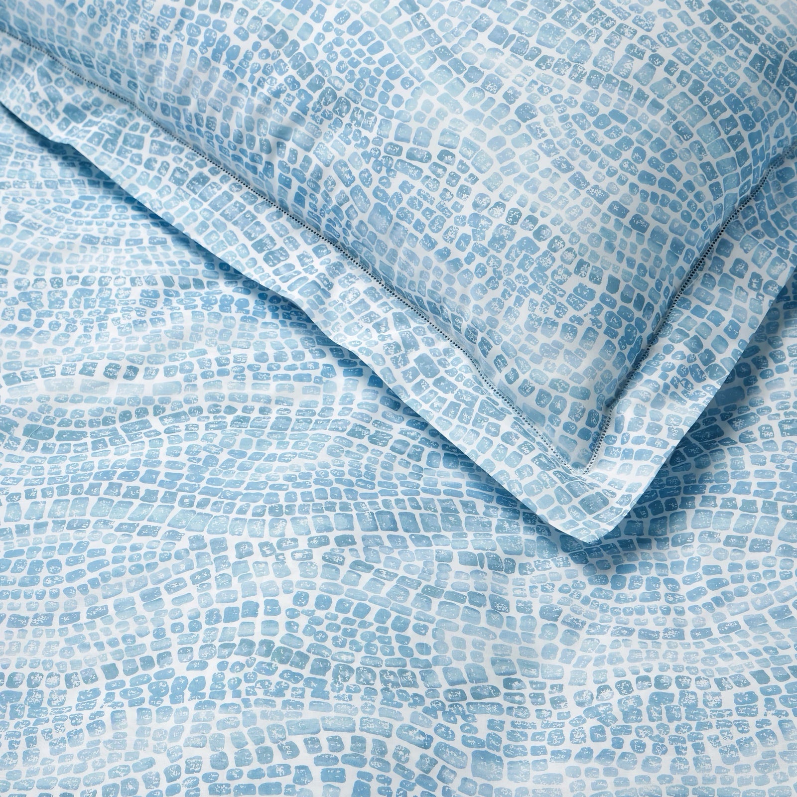 Detailed view of Sferra X Scalamandre Cobblestones Duvet Cover and Shams in Sea color