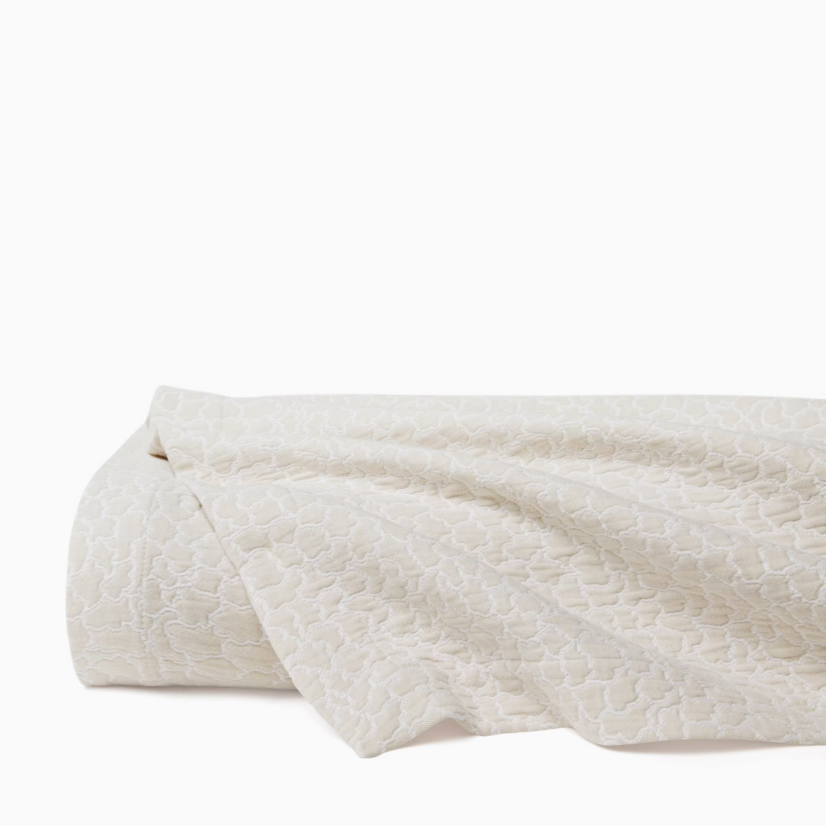 Folded White and Sand color Sferra x Scalamandre Aurelia Coverlet