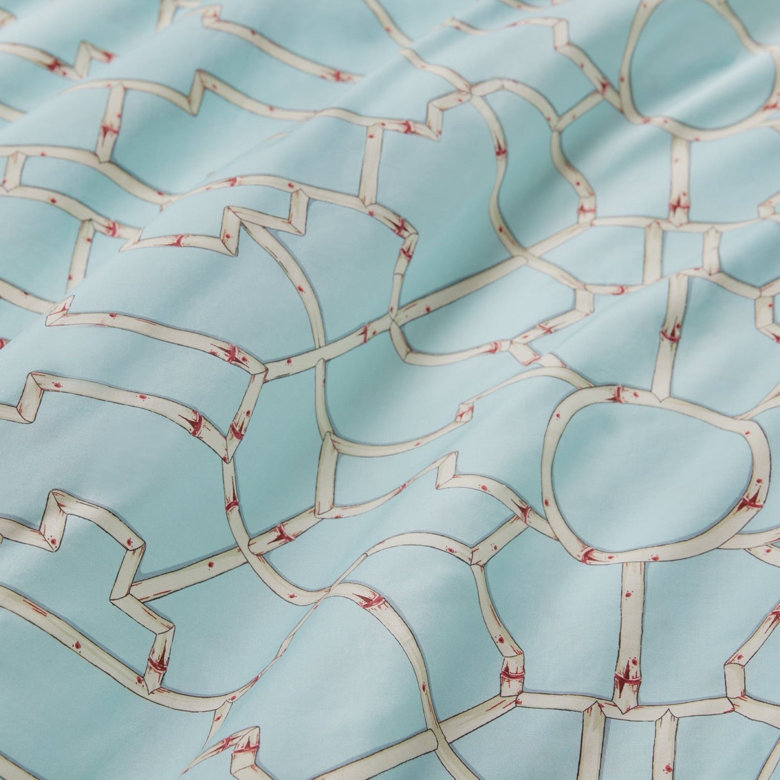 Bed in Aqua Sferra x Scalamandre Baldwin Bamboo Duvet Cover and Shams