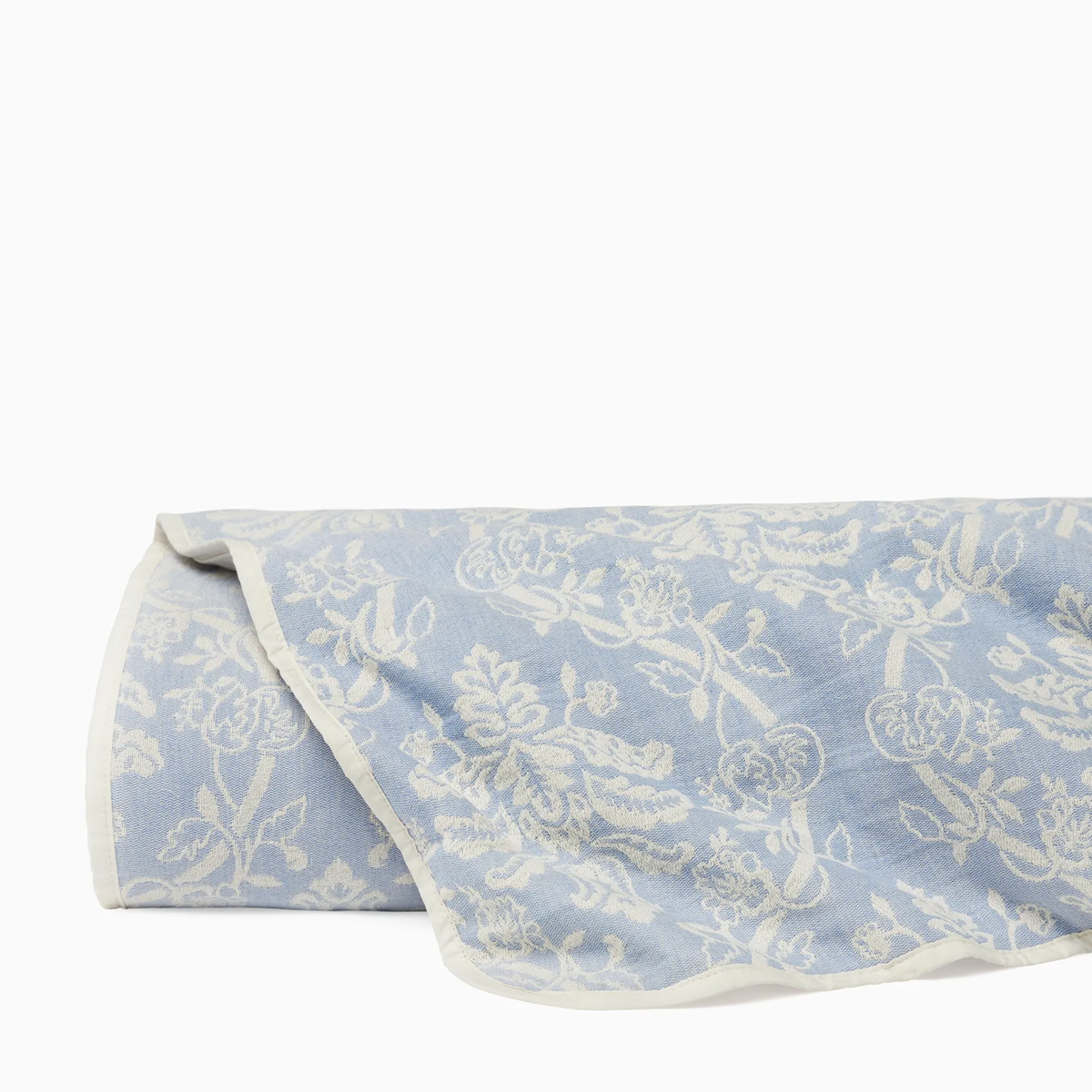 Folded Sferra x Scalamandre Isabella Quilt Coverlet in Ivory/Sea color