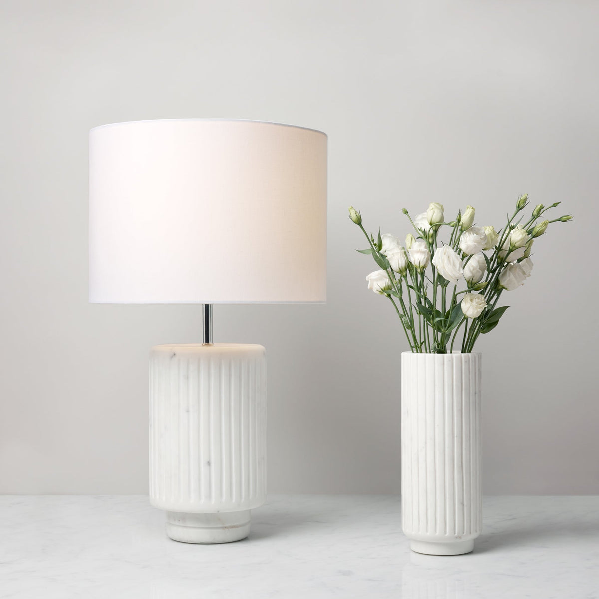 Sferra Romano marble table lamp and vase, vase with white flowers