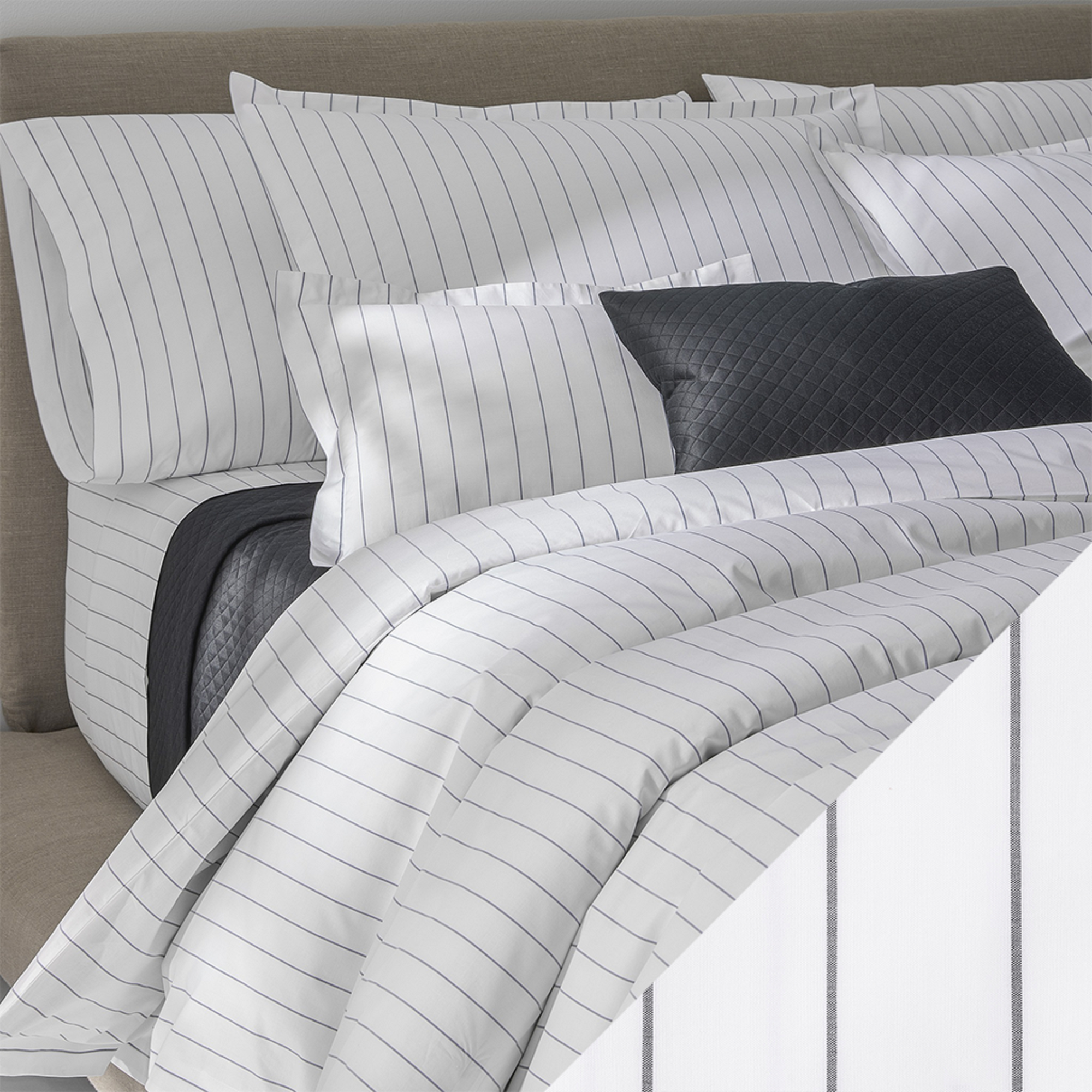 Side View of Matouk Amalfi Bedding with Charcoal Swatch Color