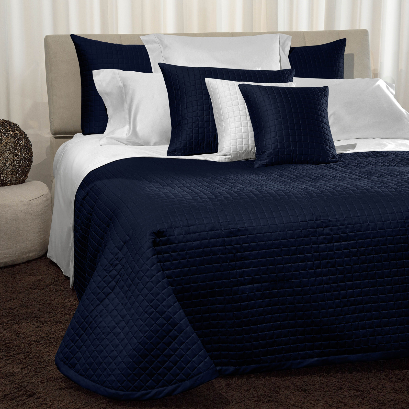 Bed Dressed in Signoria Masaccio Bedding in Dark Blue Color