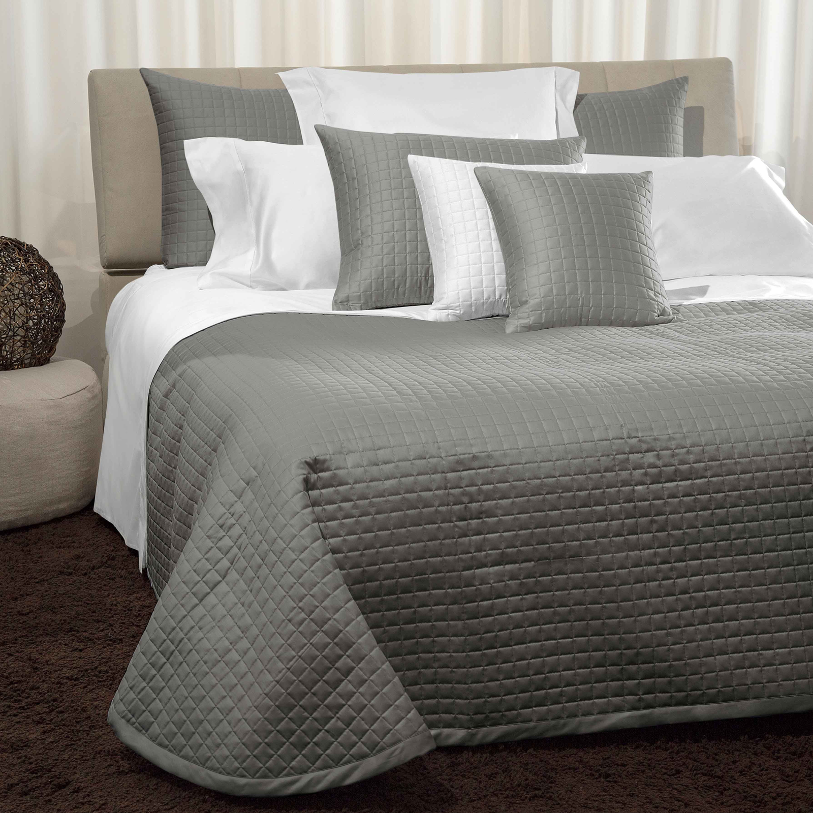 Bed Dressed in Signoria Masaccio Bedding in Lead Grey Color