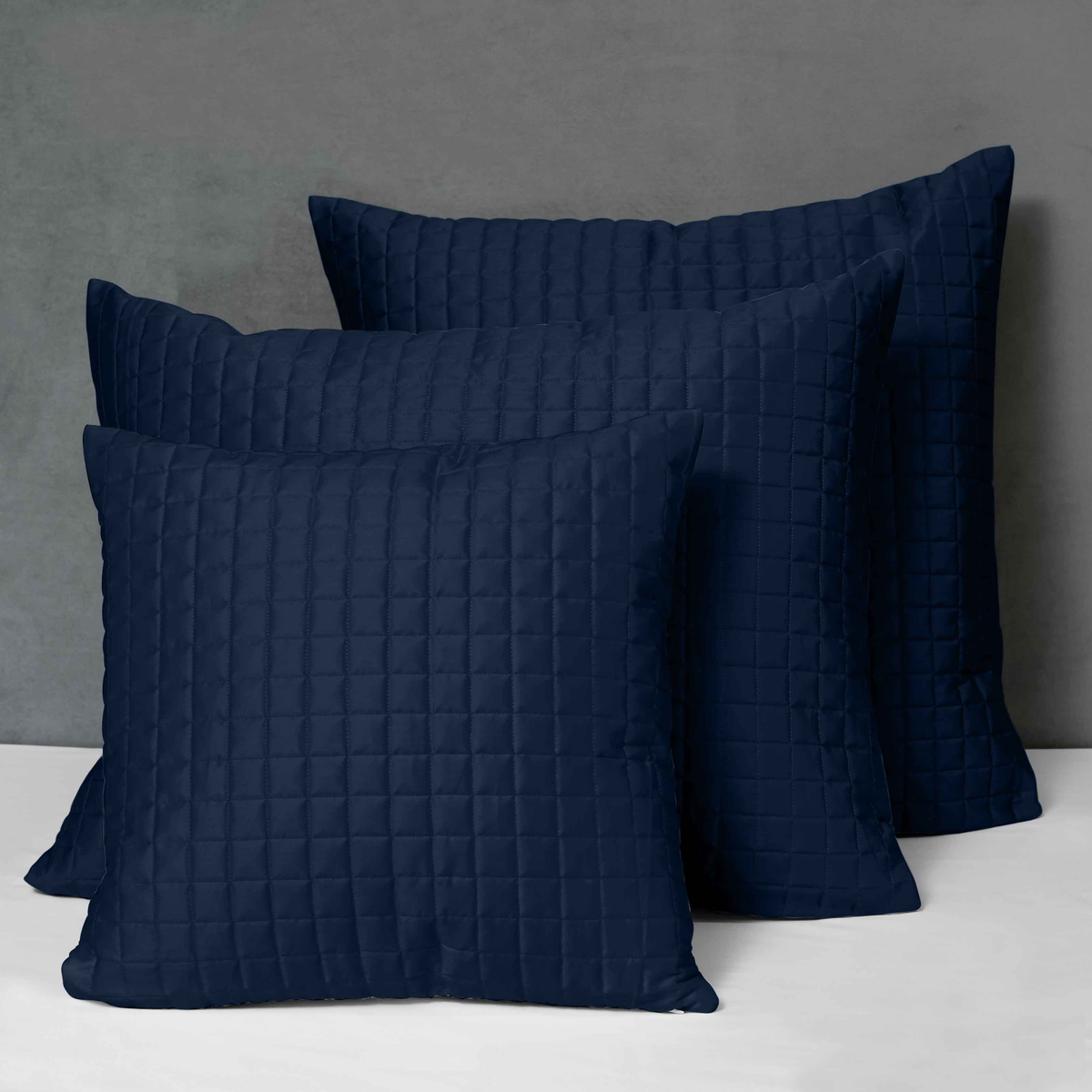 Different Sizes of Quilted Shams of Signoria Masaccio Bedding in Dark Blue Color