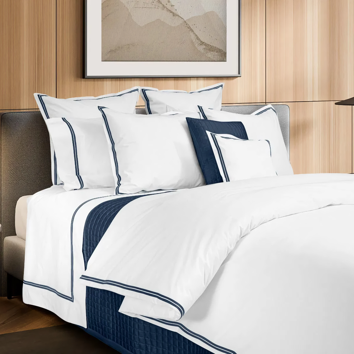 Closeup of Signoria Mylos Bedding in  White and Dark Blue