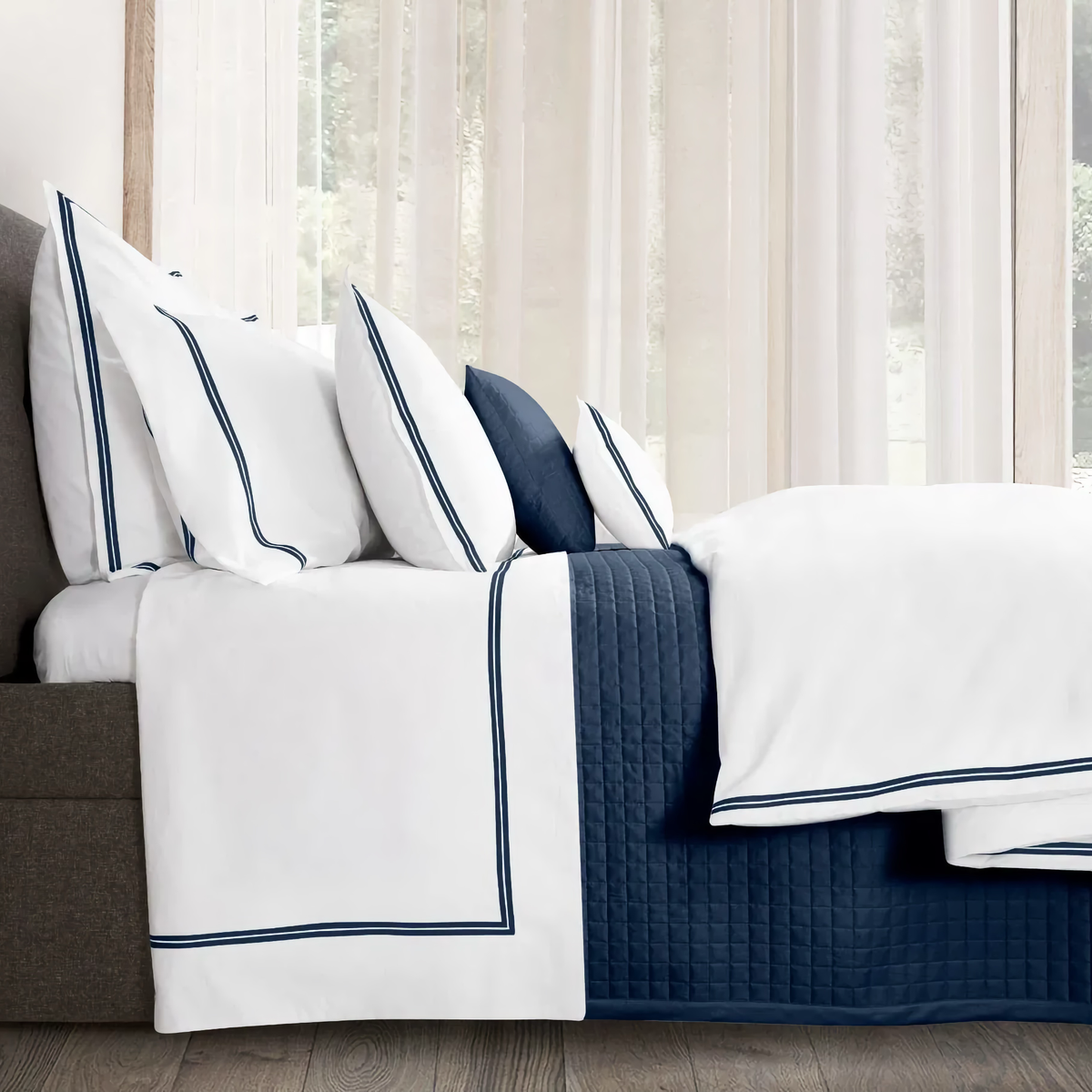 Flat Sheet of Signoria Mylos Bedding in  White and Dark Blue