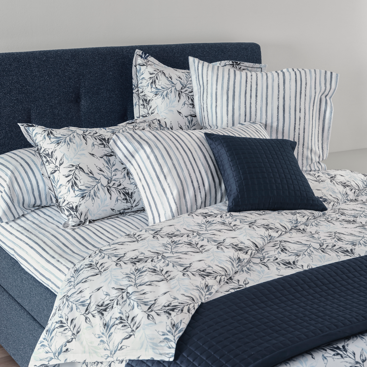 Side View of Signoria Natura Bedding in Blue Color with Complimentary Collections