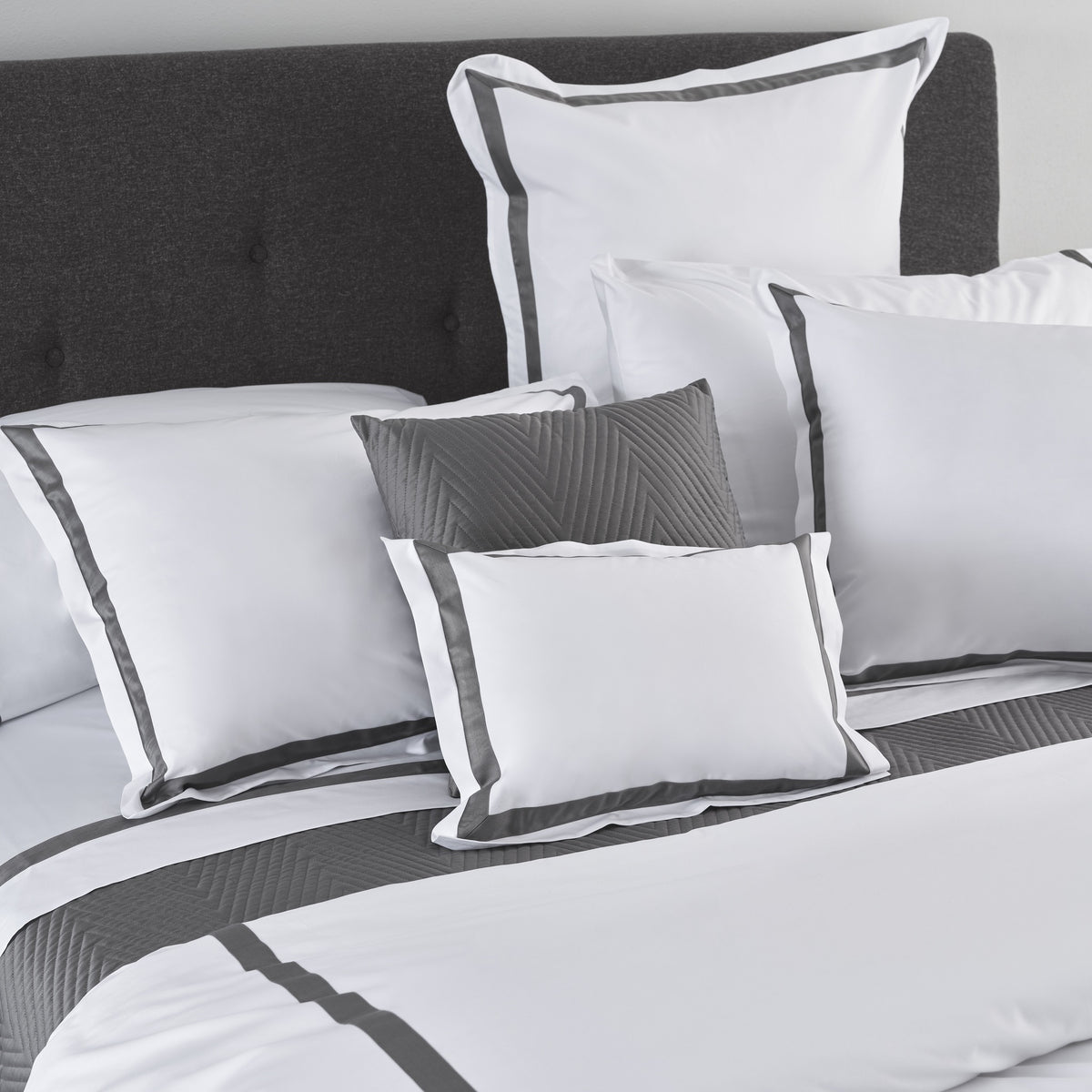 Detail of Signoria Pegaso Bedding in White/Lead Grey Color