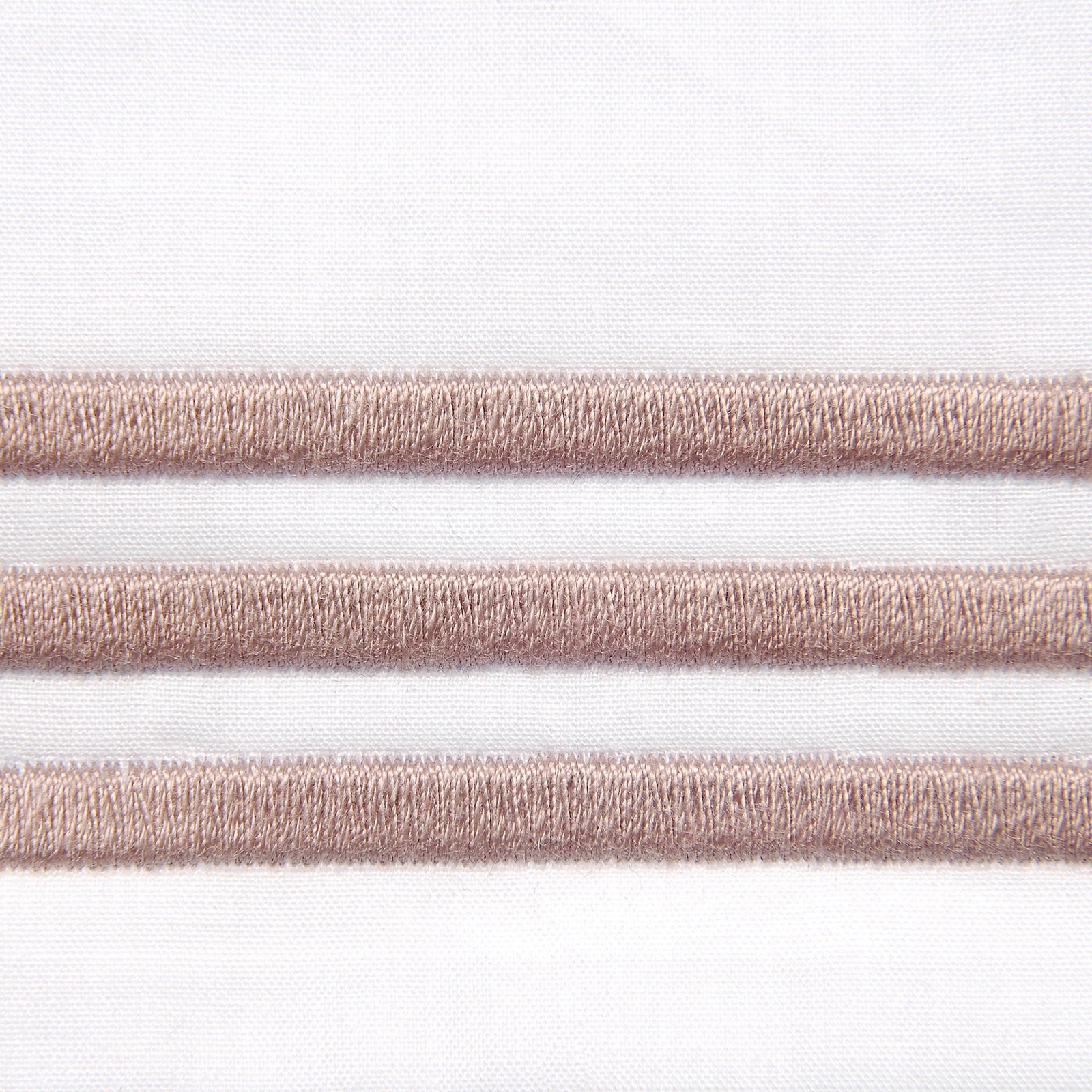 Bed Dressed in Signoria Platinum Percale Bedding in White/Antique Rose Color