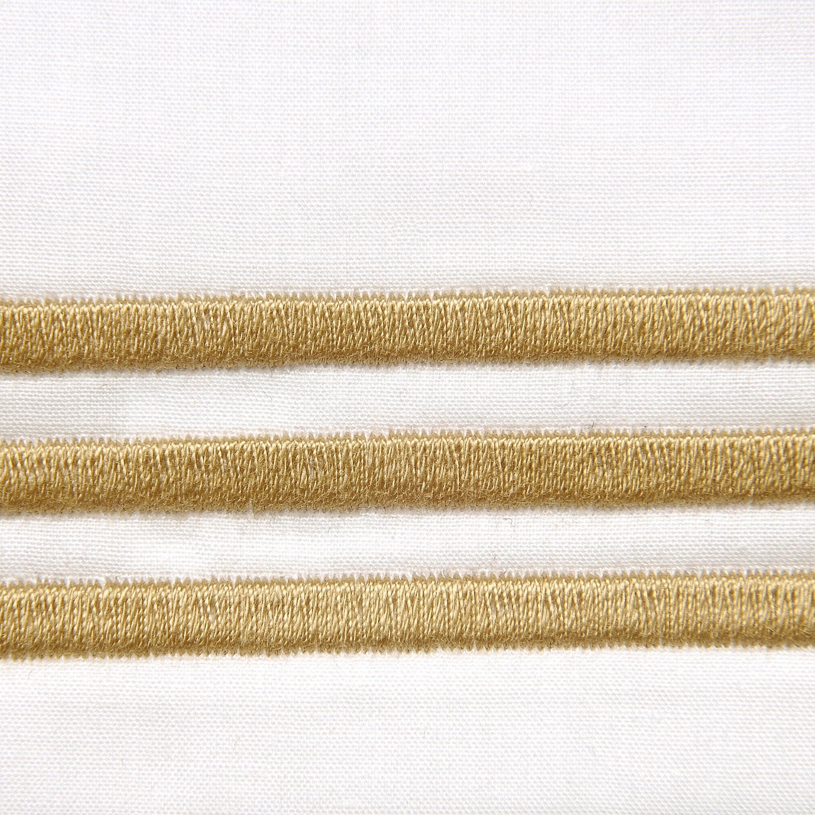 Bed Dressed in Signoria Platinum Percale Bedding in White/Caramel Color