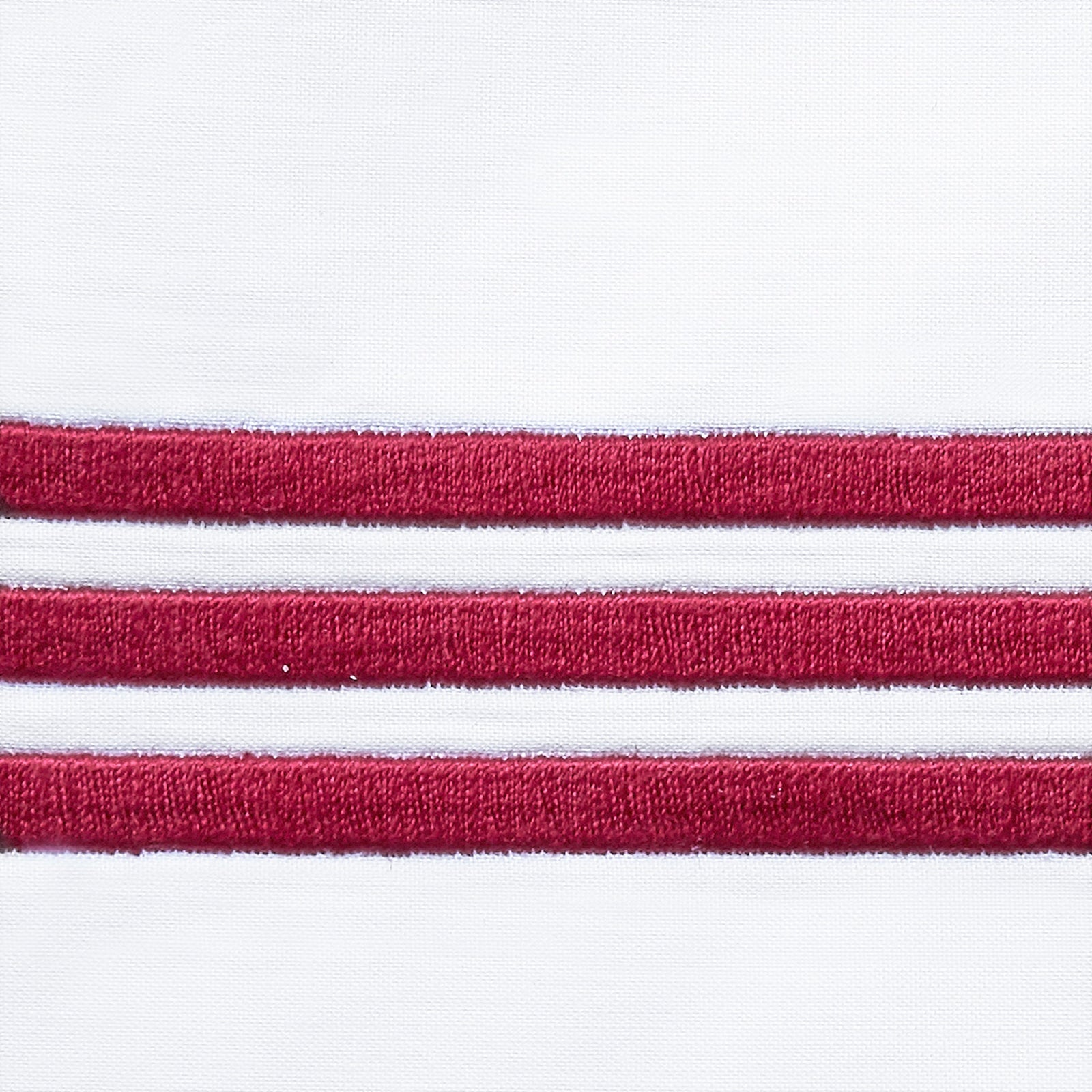 Bed Dressed in Signoria Platinum Percale Bedding in White/Cardinale Red Color