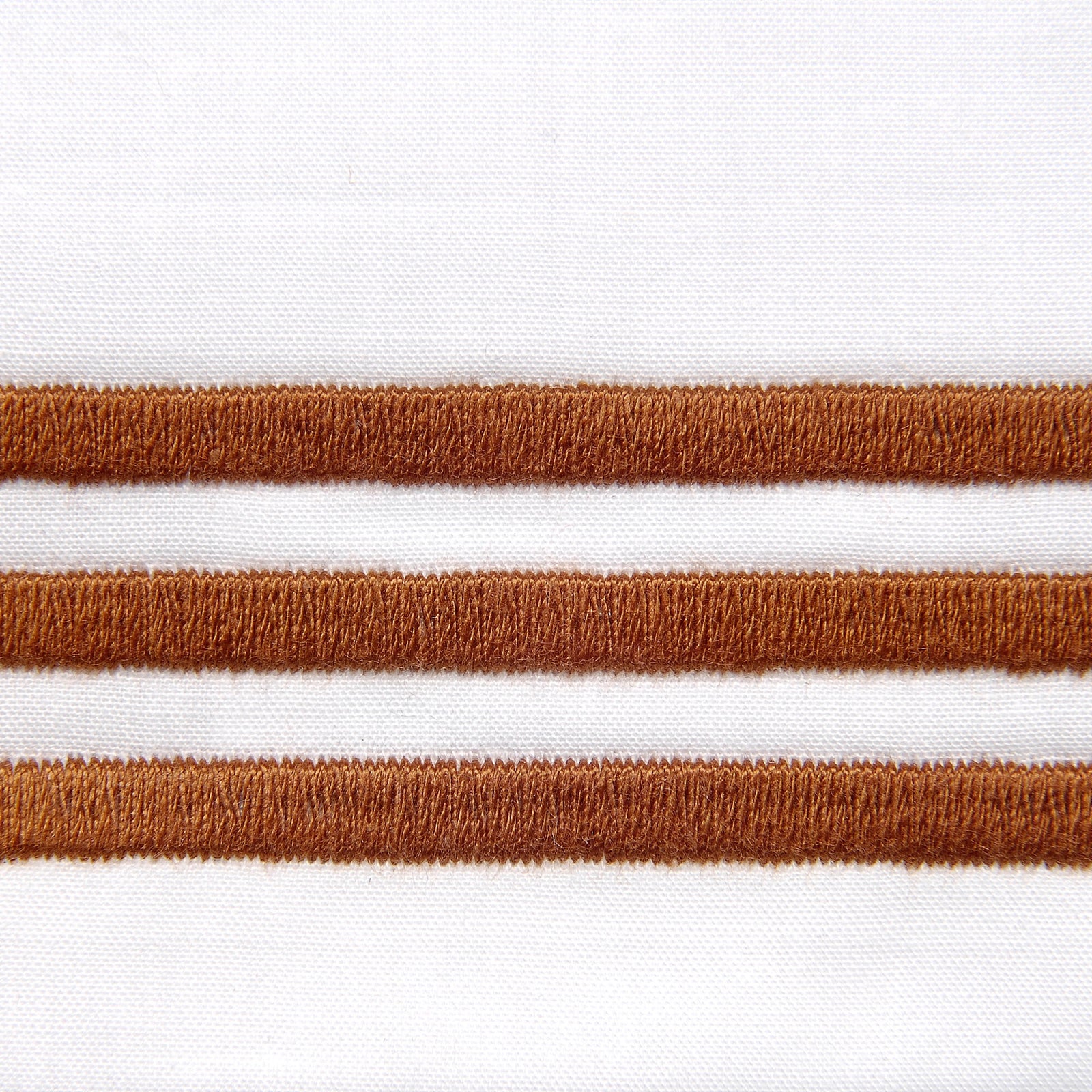 Bed Dressed in Signoria Platinum Percale Bedding in White/Cognac Color