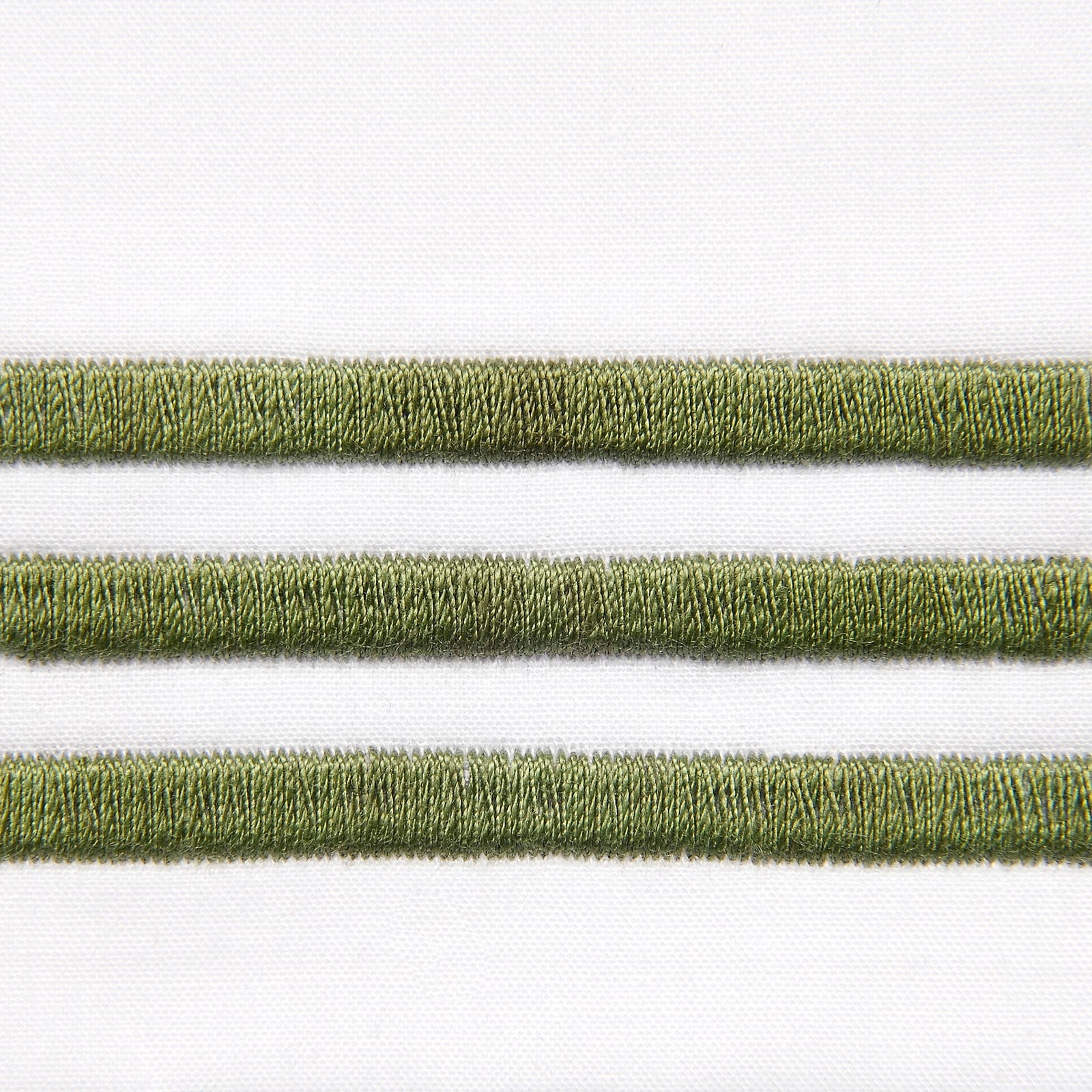 Bed Dressed in Signoria Platinum Percale Bedding in White/Moss Green Color