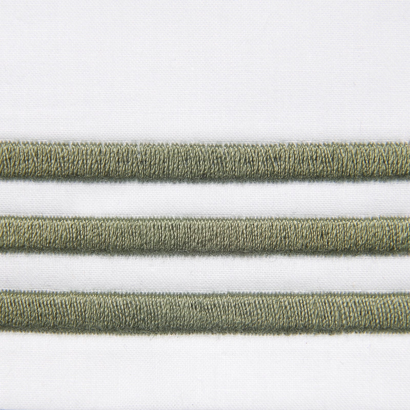 Bed Dressed in Signoria Platinum Percale Bedding in White/Olive Green Color