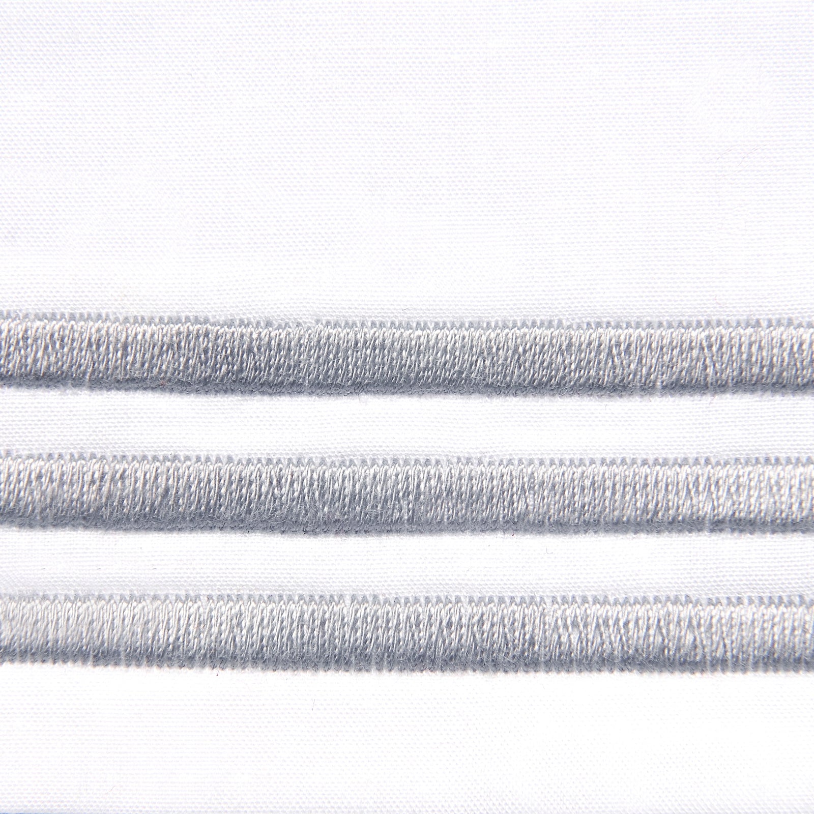 Bed Dressed in Signoria Platinum Percale Bedding in White/Pearl Color