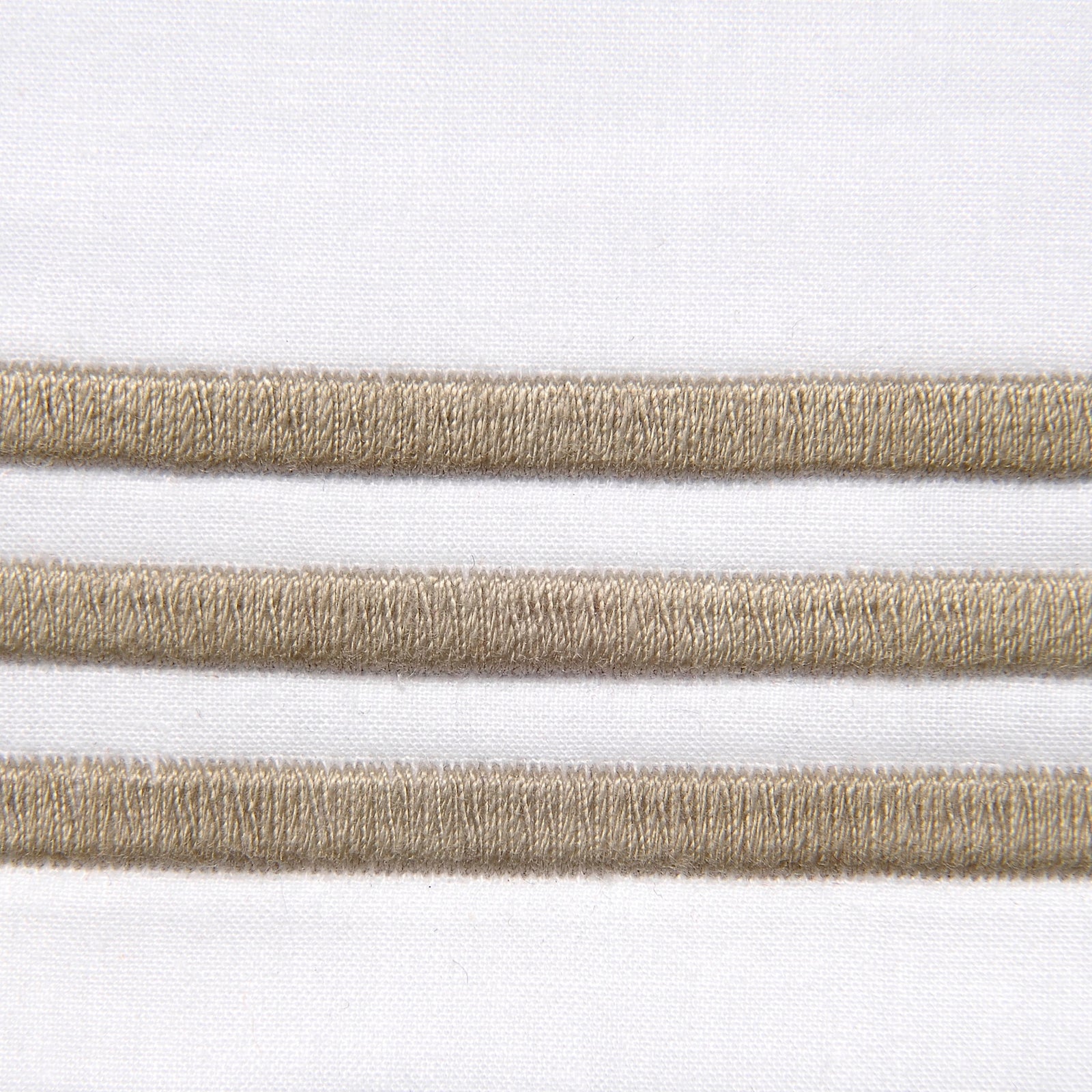 Bed Dressed in Signoria Platinum Percale Bedding in White/Taupe Color