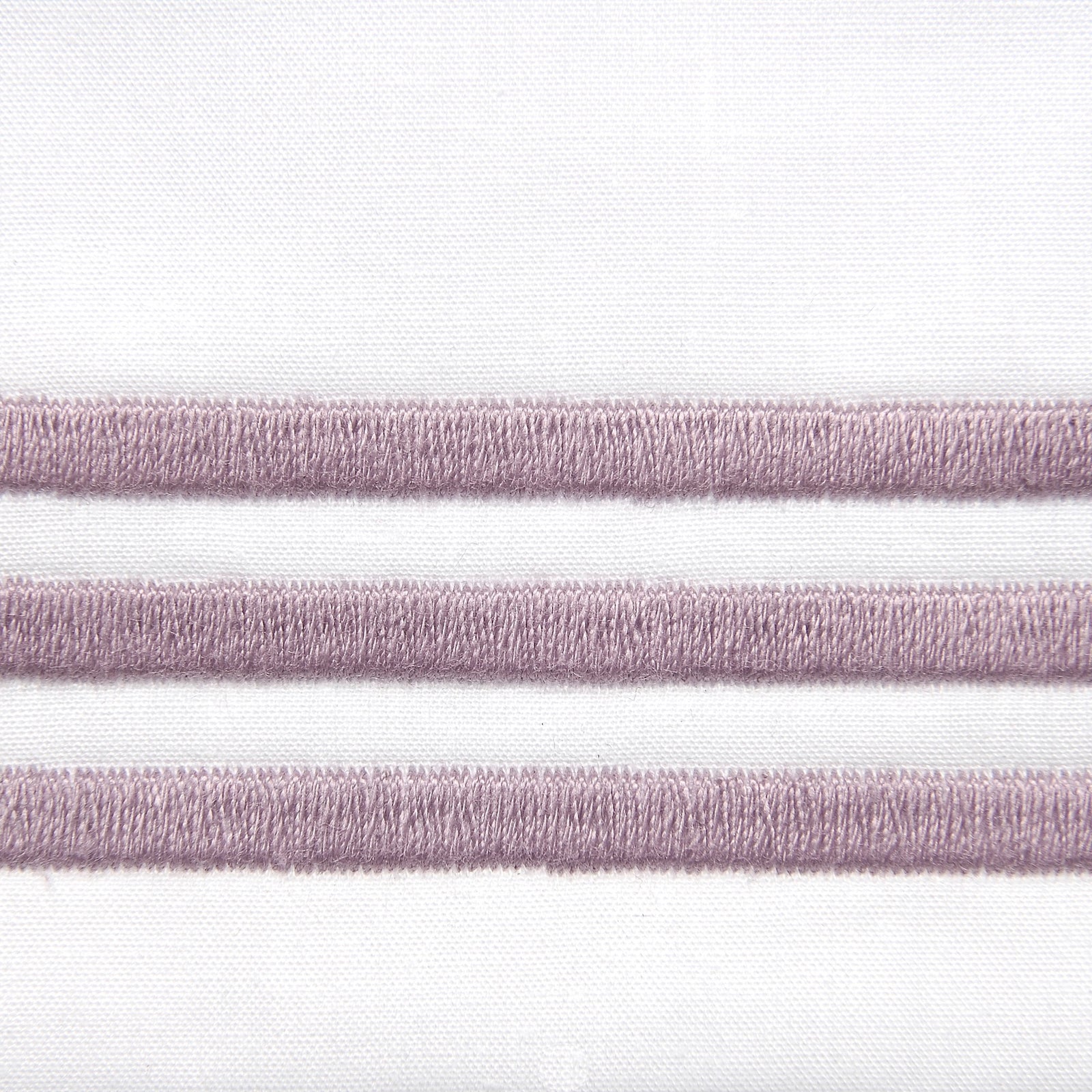 Bed Dressed in Signoria Platinum Percale Bedding in White/Thistle Color