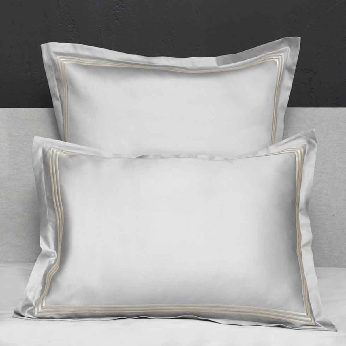 Closeup View of Signoria Platinum Sateen Shams in Pearl/Ivory Color