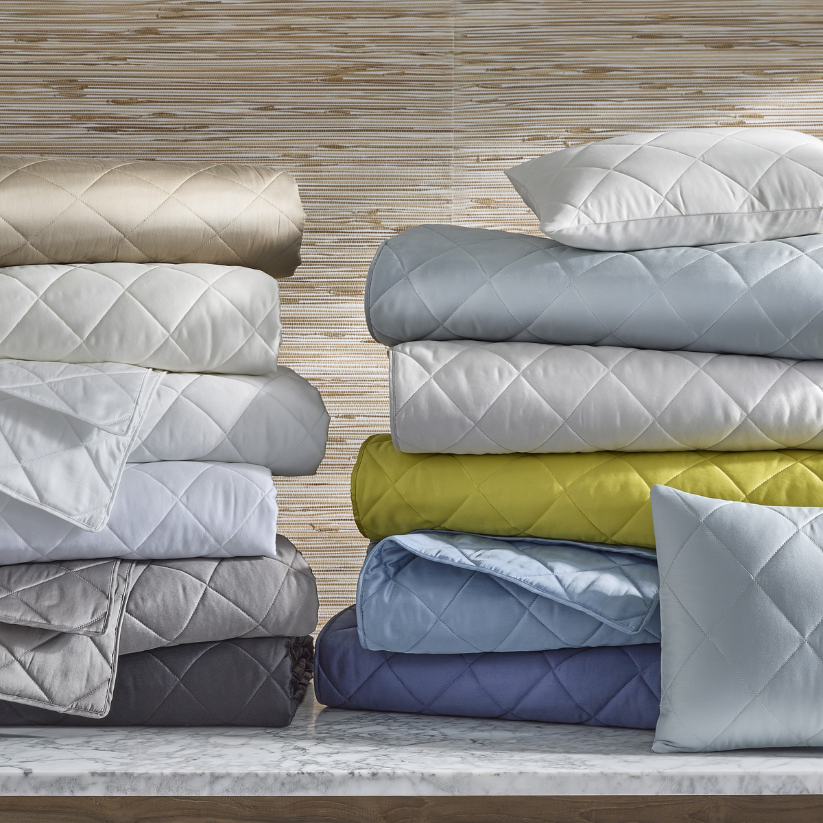 Matouk Nocturne Quilted Bedding Stacked Assorted Colors