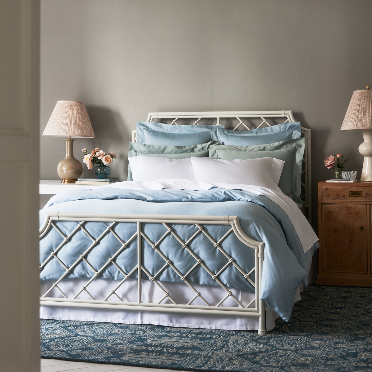 Bed made with Scandia Home Stresa Bedding in Rain, White and Heath